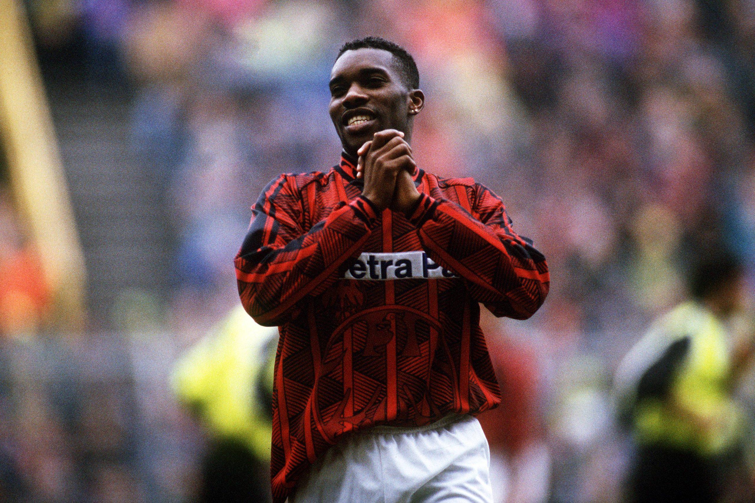 Jay Jay Okocha celebrating during action for Eintracht Frankfurt