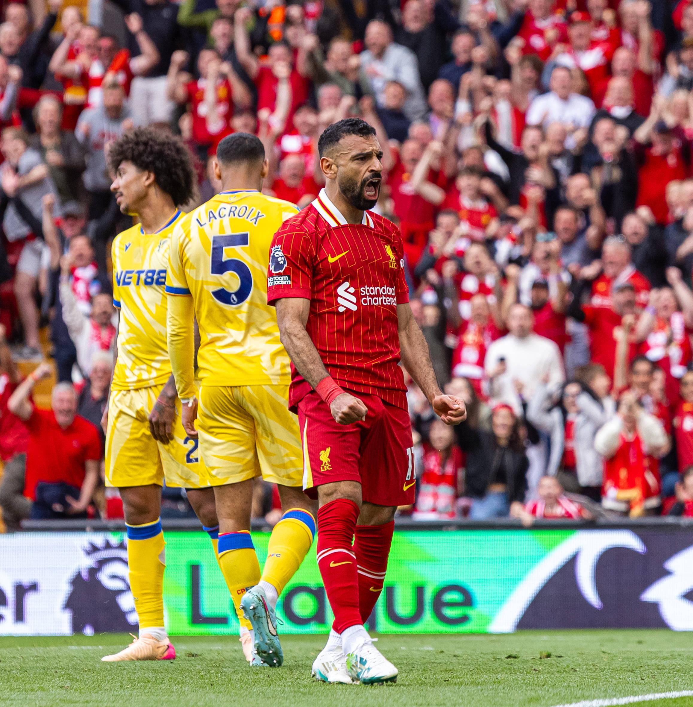 Mohamed Salah celebrates after scoring his side s first goal during the FA Premier League match between Liverpool and Crystal Palace