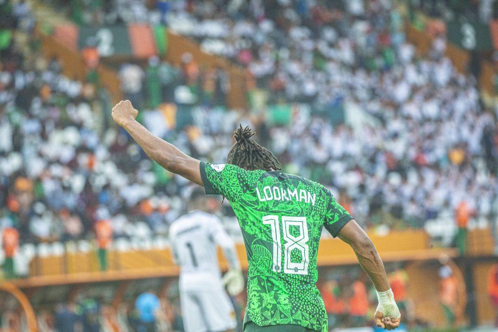 Ademola Lookman in action for the Super Eagles, Celebrating his goal against Angola at the 2023 AFCON in Cote D Ivoire