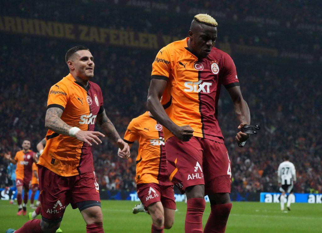 Victor Osimhen celebrates after scoring the second goal of his team with Mauro Icardi during the Turkish Super League derby match between Galatasaray and Besiktas at Rams Park Stadium in Istanbul