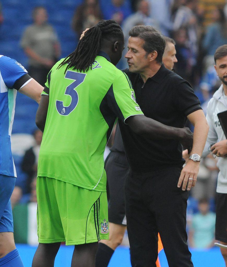 Marco Silva congratulates Calvin Bassey after the match between Fulham and Brighton