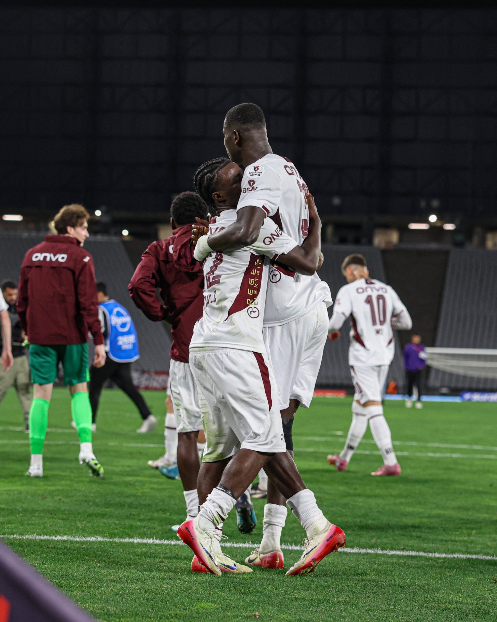 Paul Onuachu celebrates goal with Trabzonspor teammate