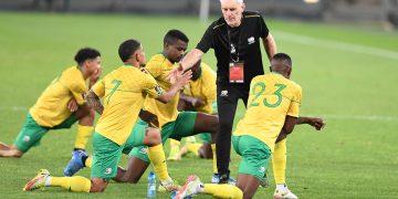 South Africa coach Hugo Broos greets players during the 2022 FIFA World Cup, qualifier match between South Africa and Zimbabwe at FNB Stadium