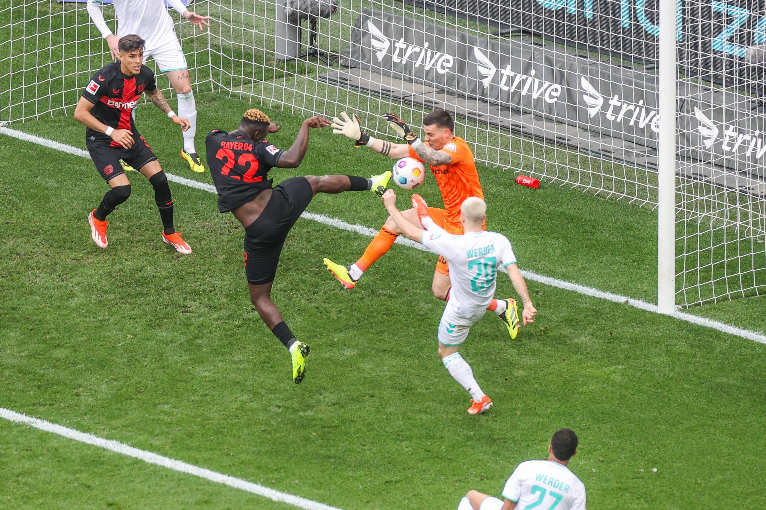 Victor Boniface and Michael Zetterer SV Werder Bremen , Romano Schmid SV Werder Bremen Leverkusen BayArena