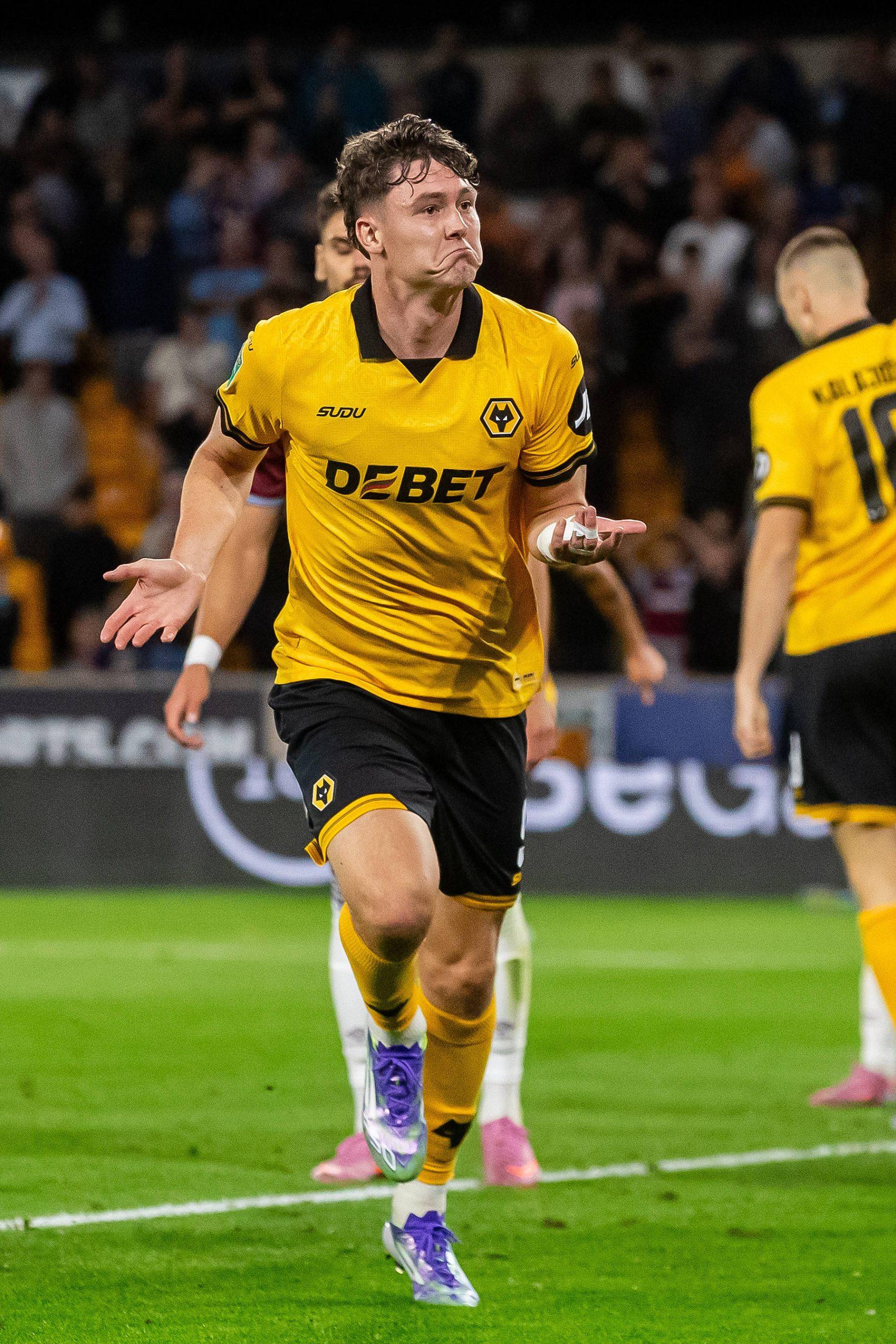 Wolverhampton Wanderers forward Jorgen Strand Larsen 9 scores and celebrates