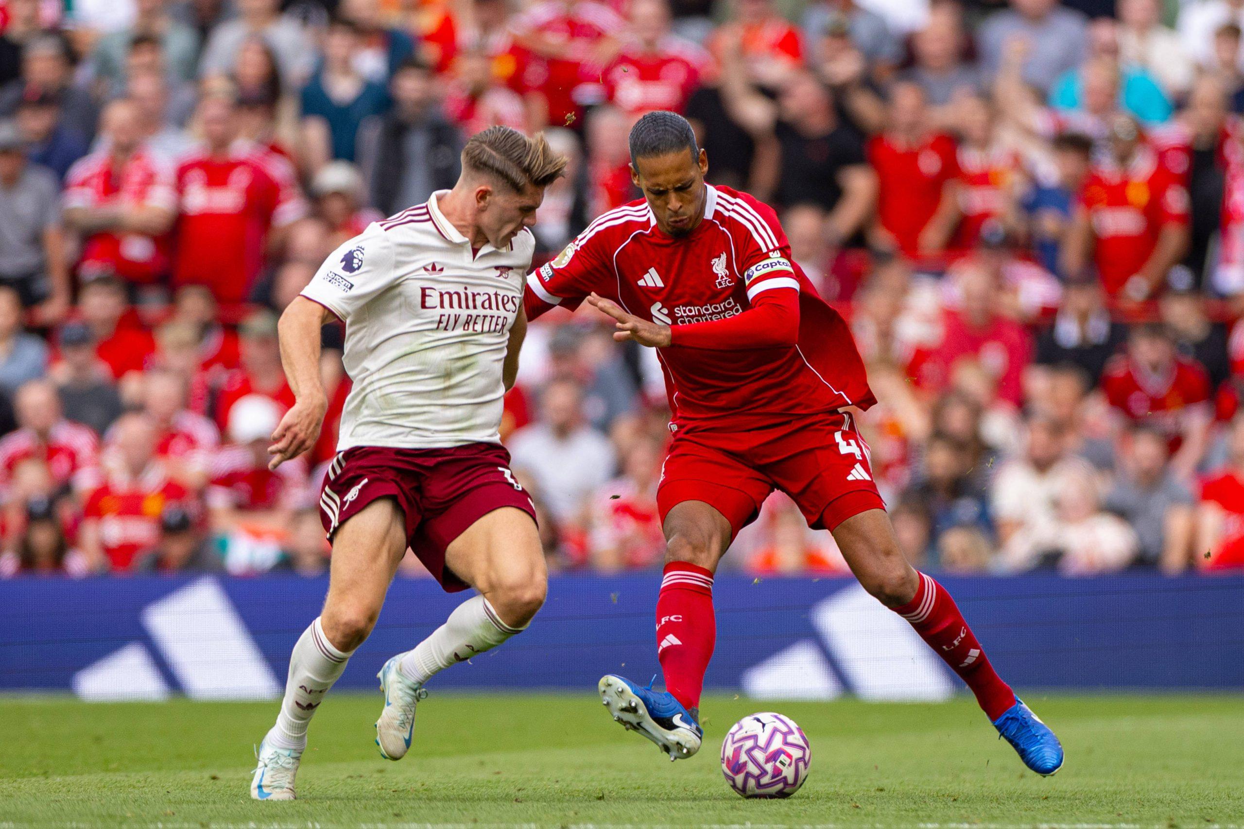 Liverpool s captain Virgil van Dijk is challenged by Arsenal s Viktor Gyökeres during the FA Premier League match between Liverpool FC and Arsenal FC