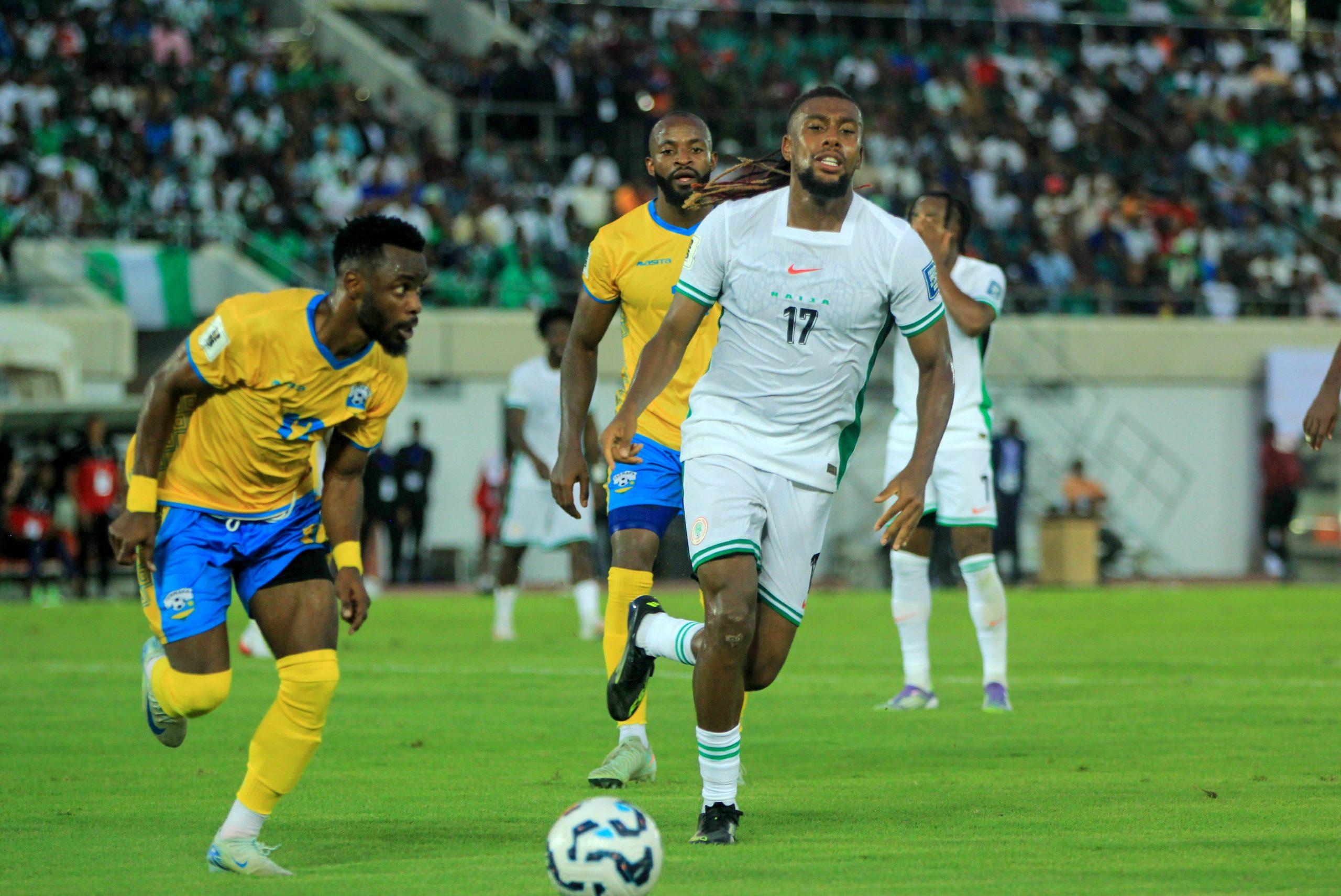 Alex Iwobi of Nigeria and Gilbert Mugisha of Rwanda during the 2026 FIFA World Cup qualifying match between the Super Eagles of Nigeria and the Amavubi of Rwanda