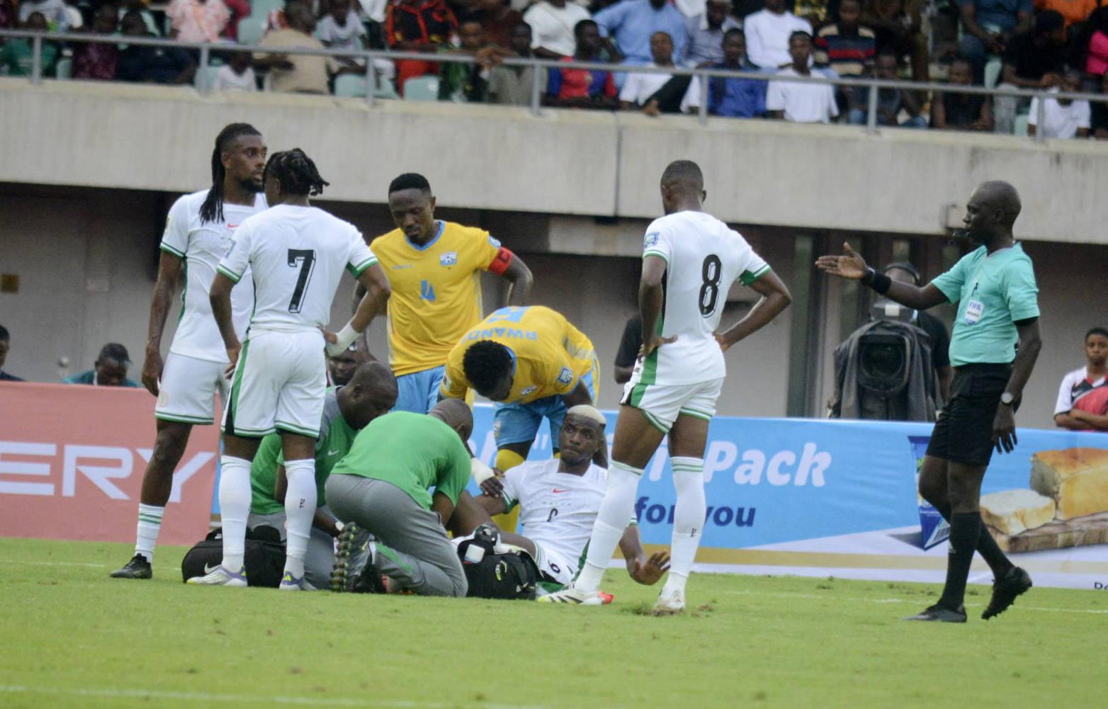 Injured Victor Osimhen of Nigeria receives treatment during the 2026 FIFA World Cup Qualifier match between Nigeria Super Eagles and Rwanda