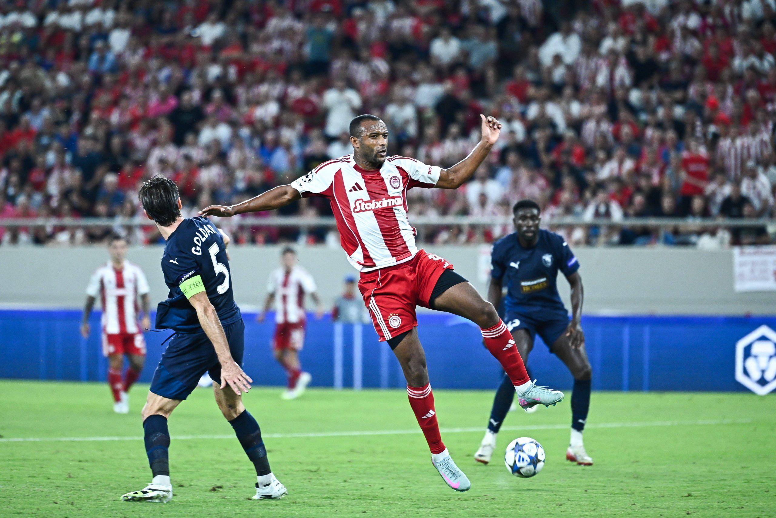 Ayoub El Kaabi of Olympiacos competes for the ball