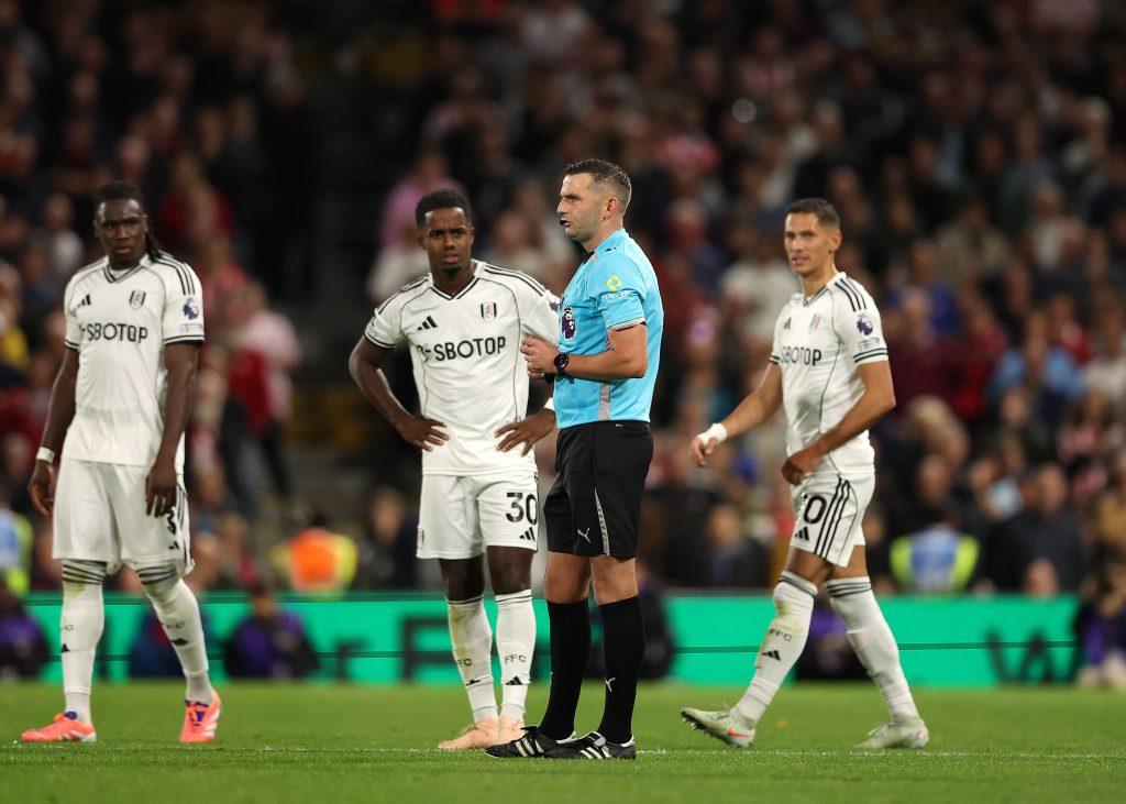 Referee Michael Oliver announces that Rodrigo Muniz of Fulham 4th goal in the 59th to make it 4-1 was later ruled no goal by VAR for an earlier foul