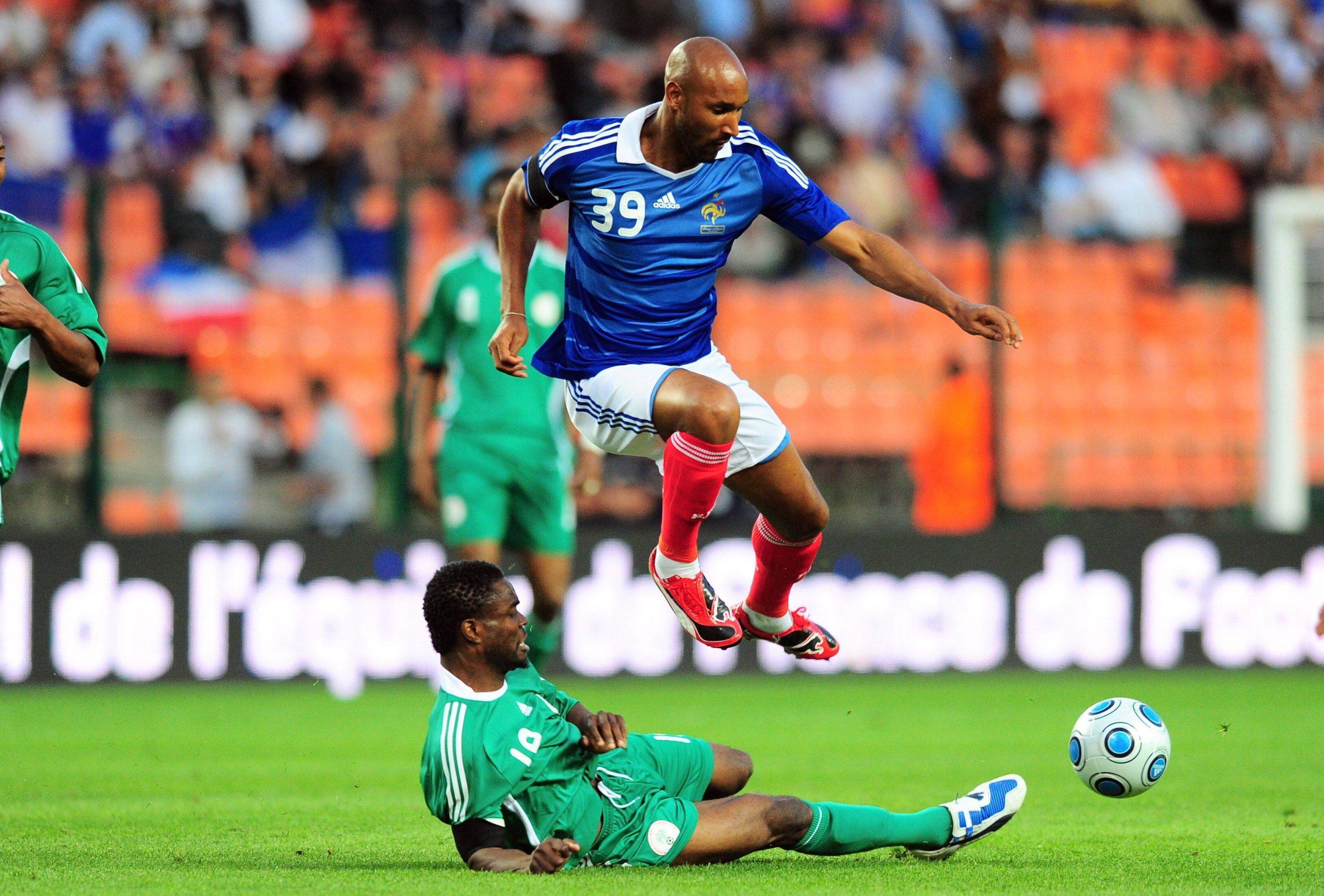Nicolas Anelka France right against Sam Sodje Nigeria 