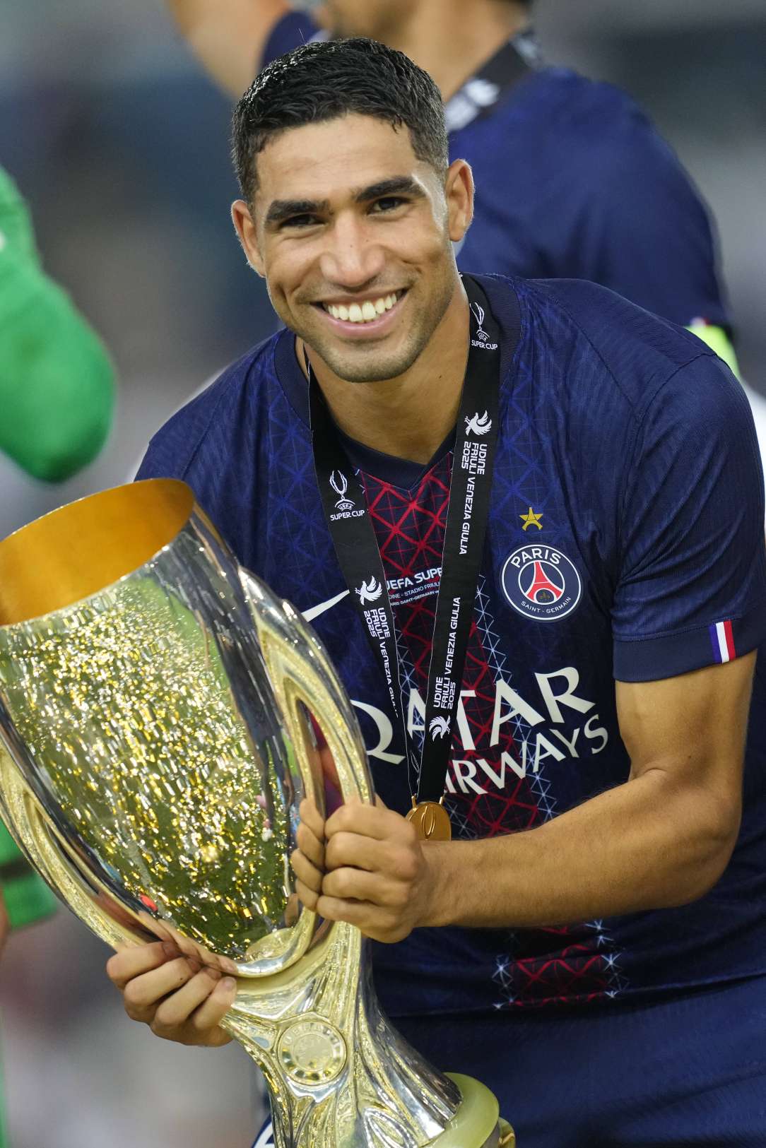 Achraf Hakimi with the Super Cup trophy at PSG