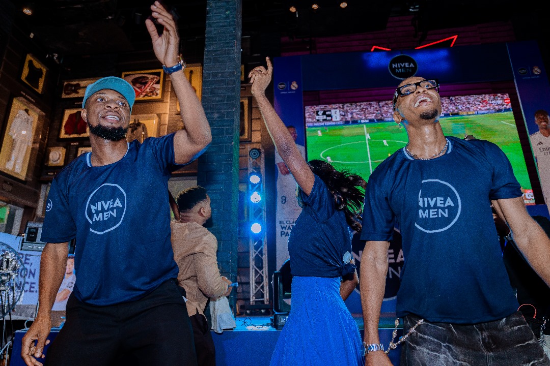MC Lively and Groovy cheer the Nigerian fans during watch party