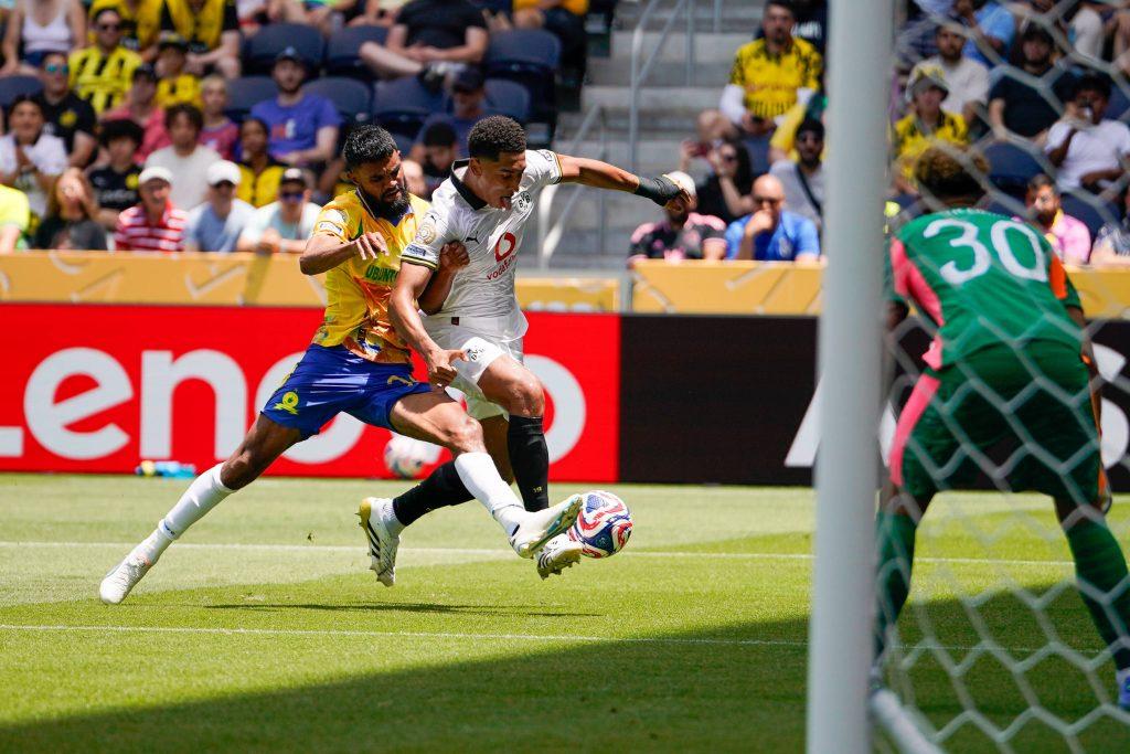 Keanu Cupido defends off Borussia Dortmund midfielder Jobe Bellingham from a goal scoring opertunity during an Fifa Club World Cup game at TQL Stadium Cincinnati