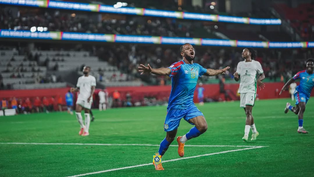 Meschack Elia celebrates goal for DR Congo