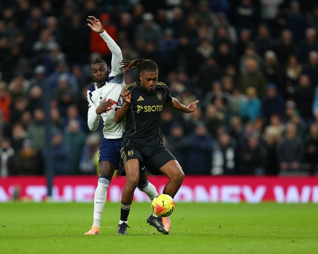 Randal Kolo Muani closes down Alex Iwobi during the Premier League game between Tottenham Hotspur and Fulham