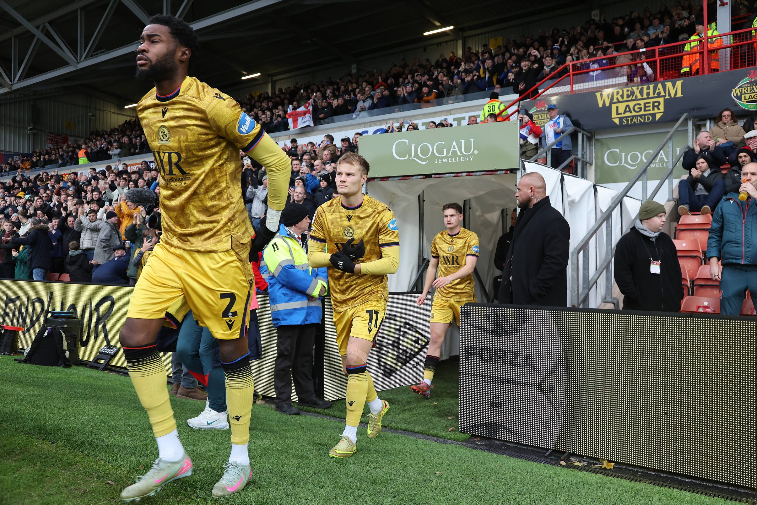 Blackburn Rovers defender Ryan Alebiosu, Andri GuÃjohnsen, Taylor Gardner-Hickman 5 walk out during the EFL Sky Bet Championship match between Wrexham FC and Blackburn Rovers
