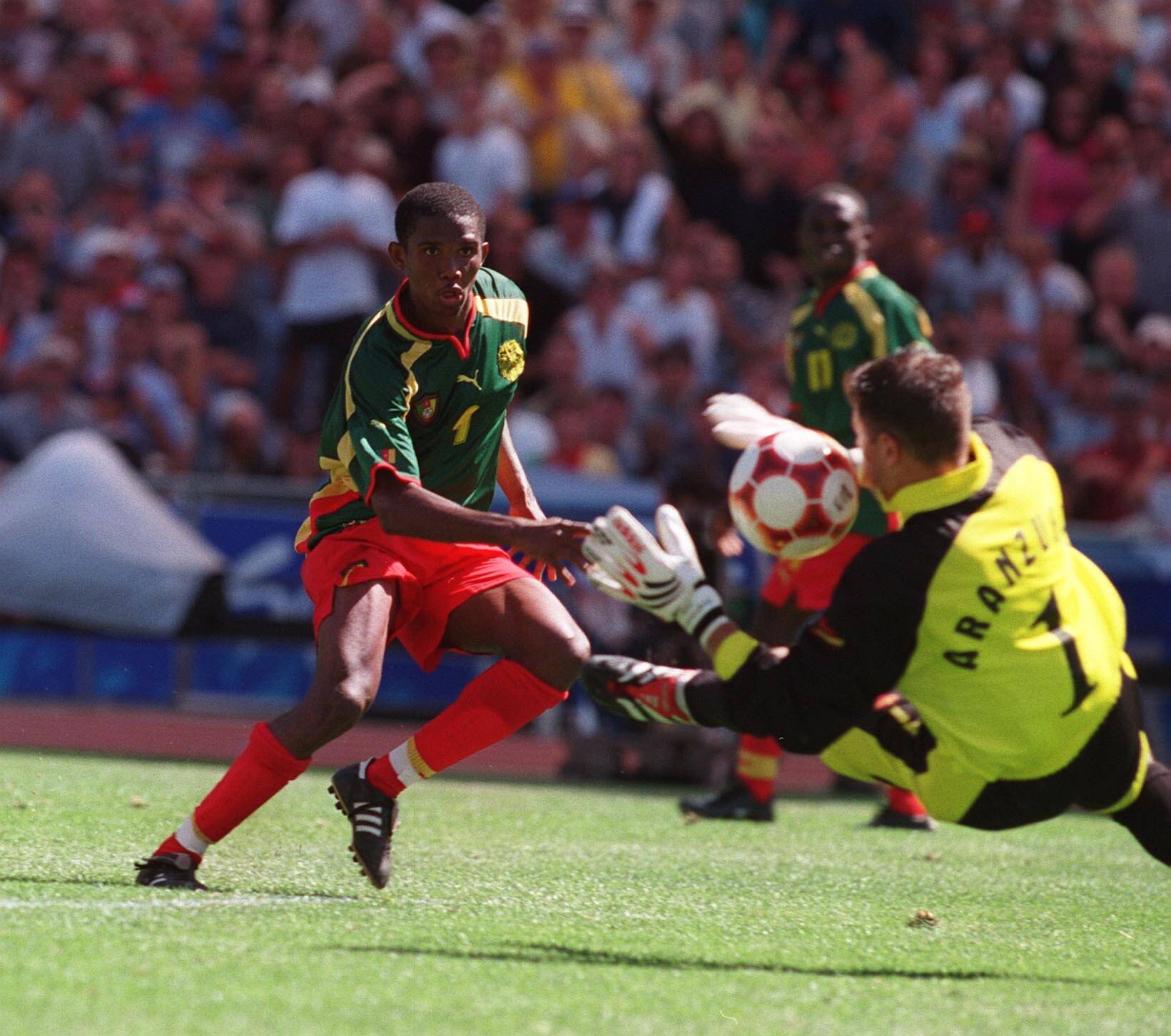 Samuel Eto o of gold medalists Cameroon shoots on goalkeeper Aranzubia during the final against Spain at The Summer Olympic Games
