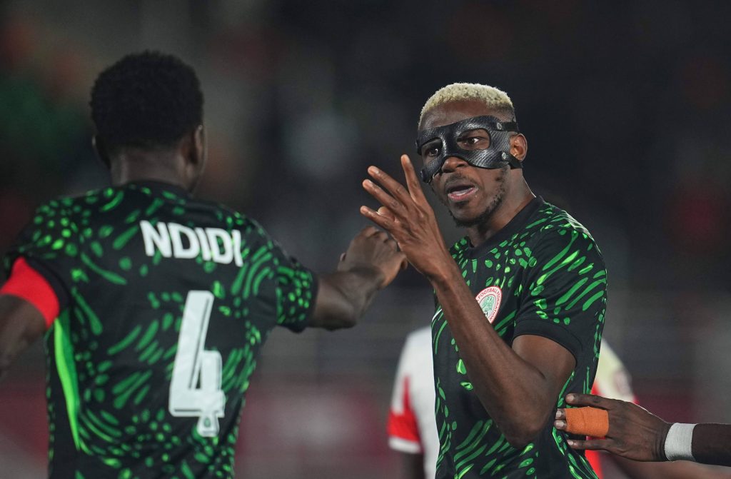 Victor James Osimhen gestures to Wilfred Ndidi during the Africa Cup Of Nations match between Mozambique and Nigeria