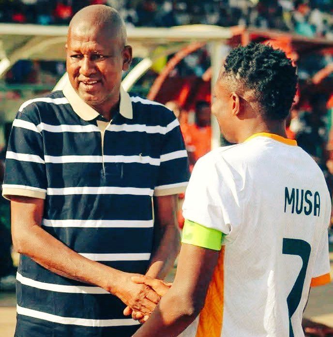Flying Eagles head coach Abdul Maikaba and former Super Eagles captain Ahmed Musa