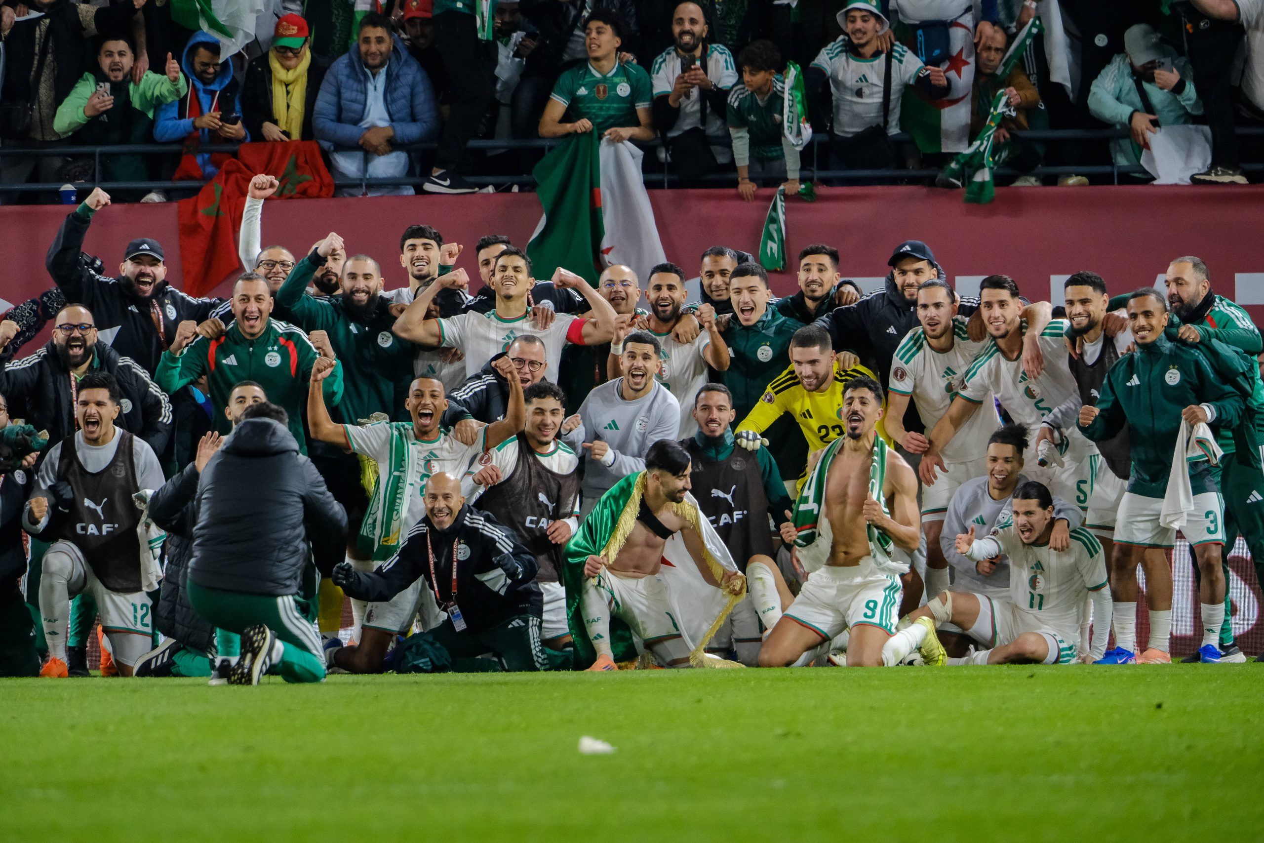 Algeria players and staff celebrate historic win over DR Congo