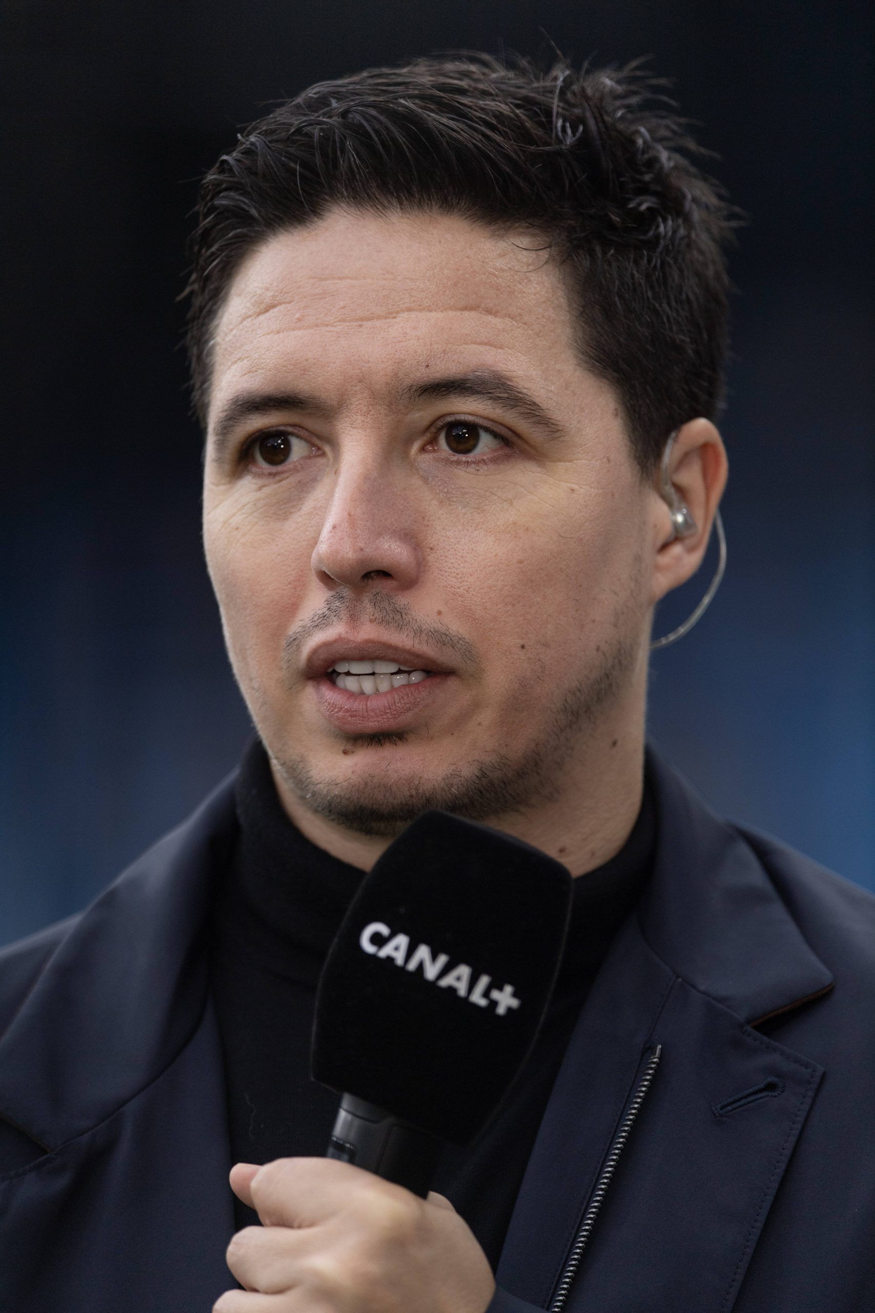 Former Arsenal and Manchester City player Samir Nasri working as a pundit