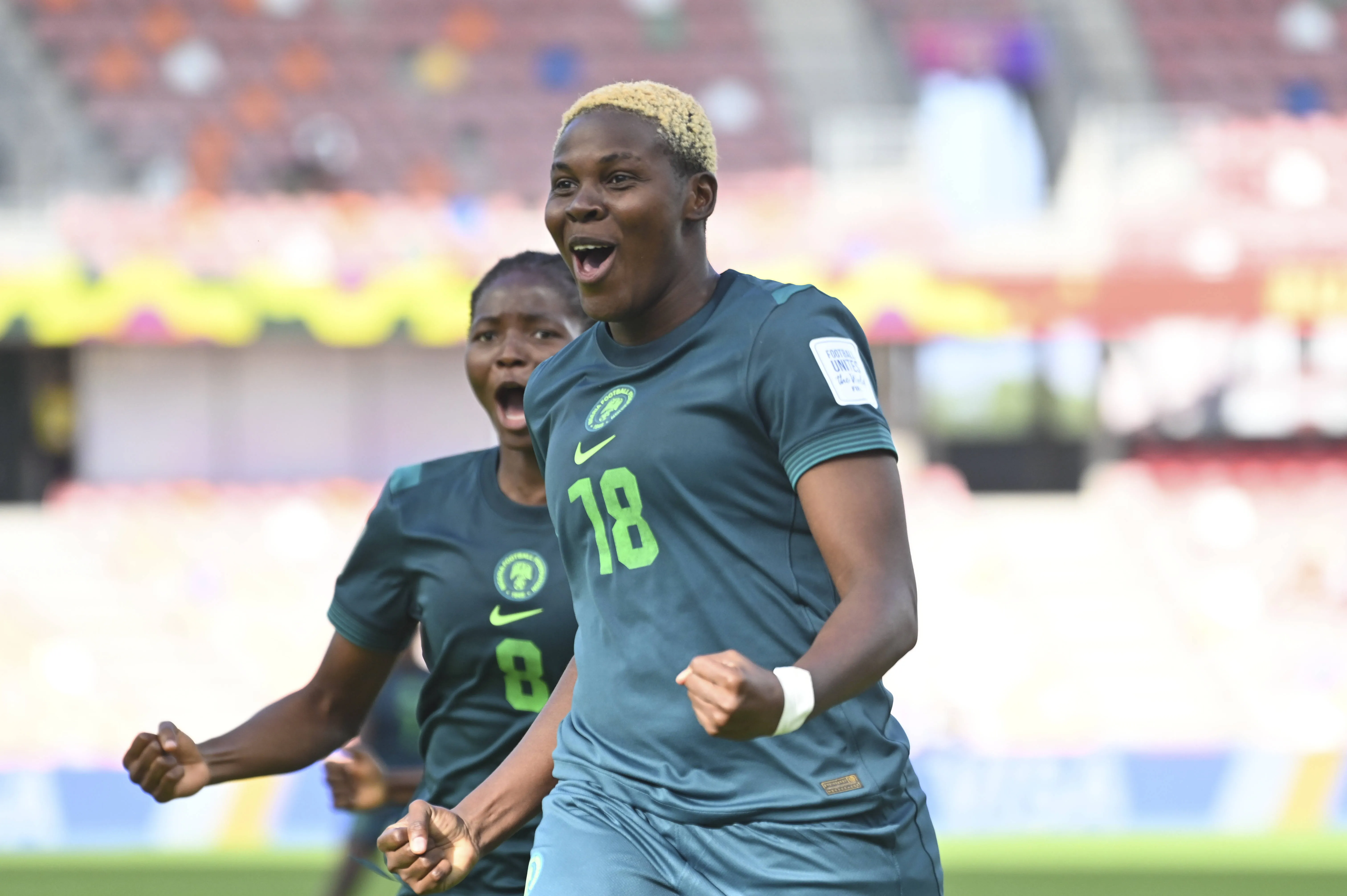Seimeyeha Janet Akekoromowei celebrating after scoring for the Falconets