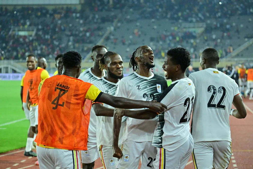Players of Uganda celebrate after scoring during the 2026 FIFA World Cup Qualifiers football match between Mozambique and Uganda in Kampala, Uganda