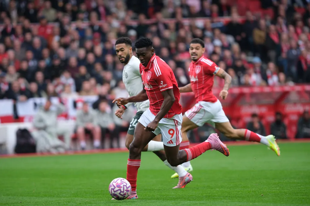 Taiwo Awoniyi runs with the ball during the Premier league football match between Nottingham Forest and Chelsea