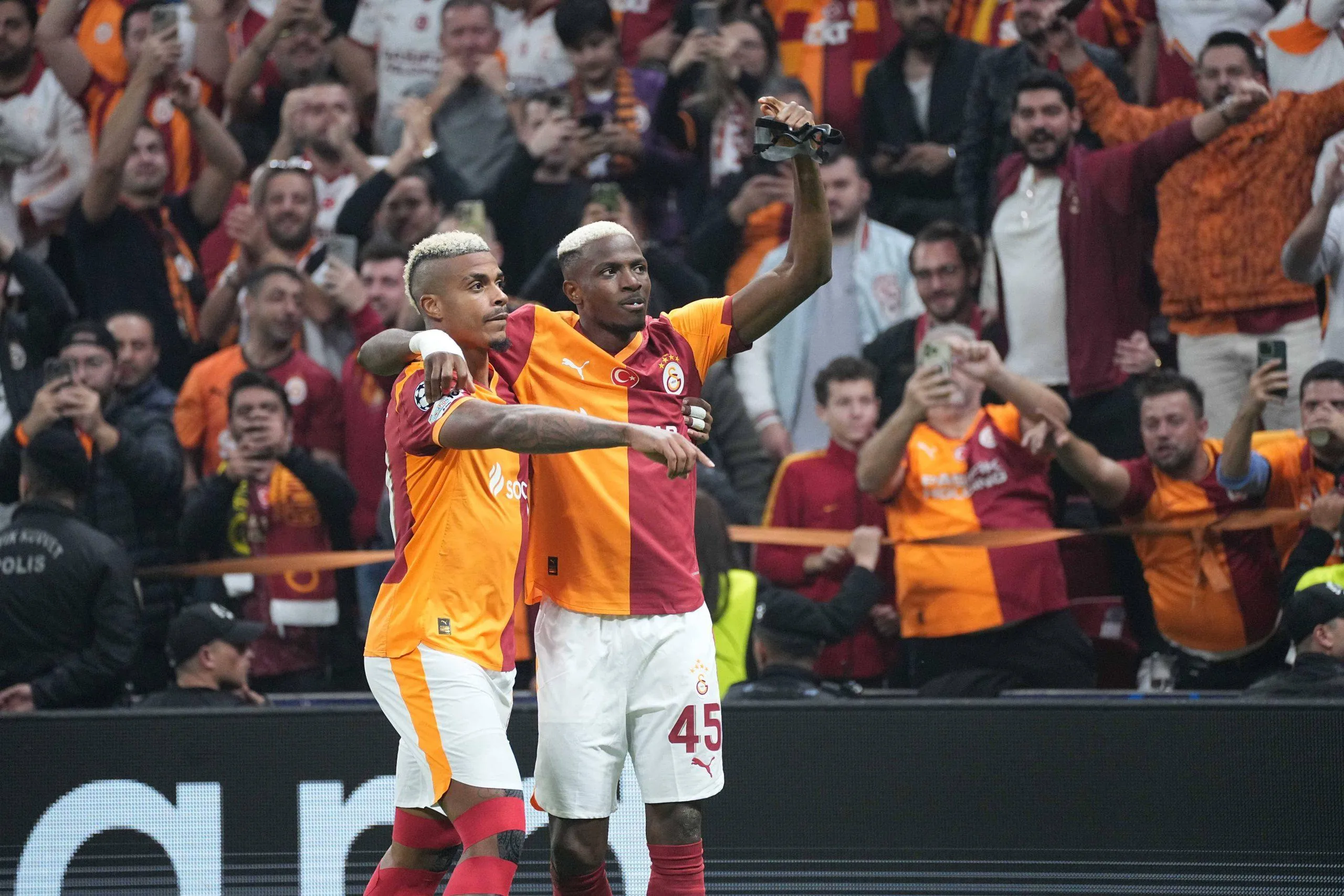 Victor Osimhen R celebrates his goal with teammate Mario Lemina during the UEFA Champions League league phase match between Galatasaray SK and FK Bodo/Glimt in Istanbul, Turkey, 22 October 2025