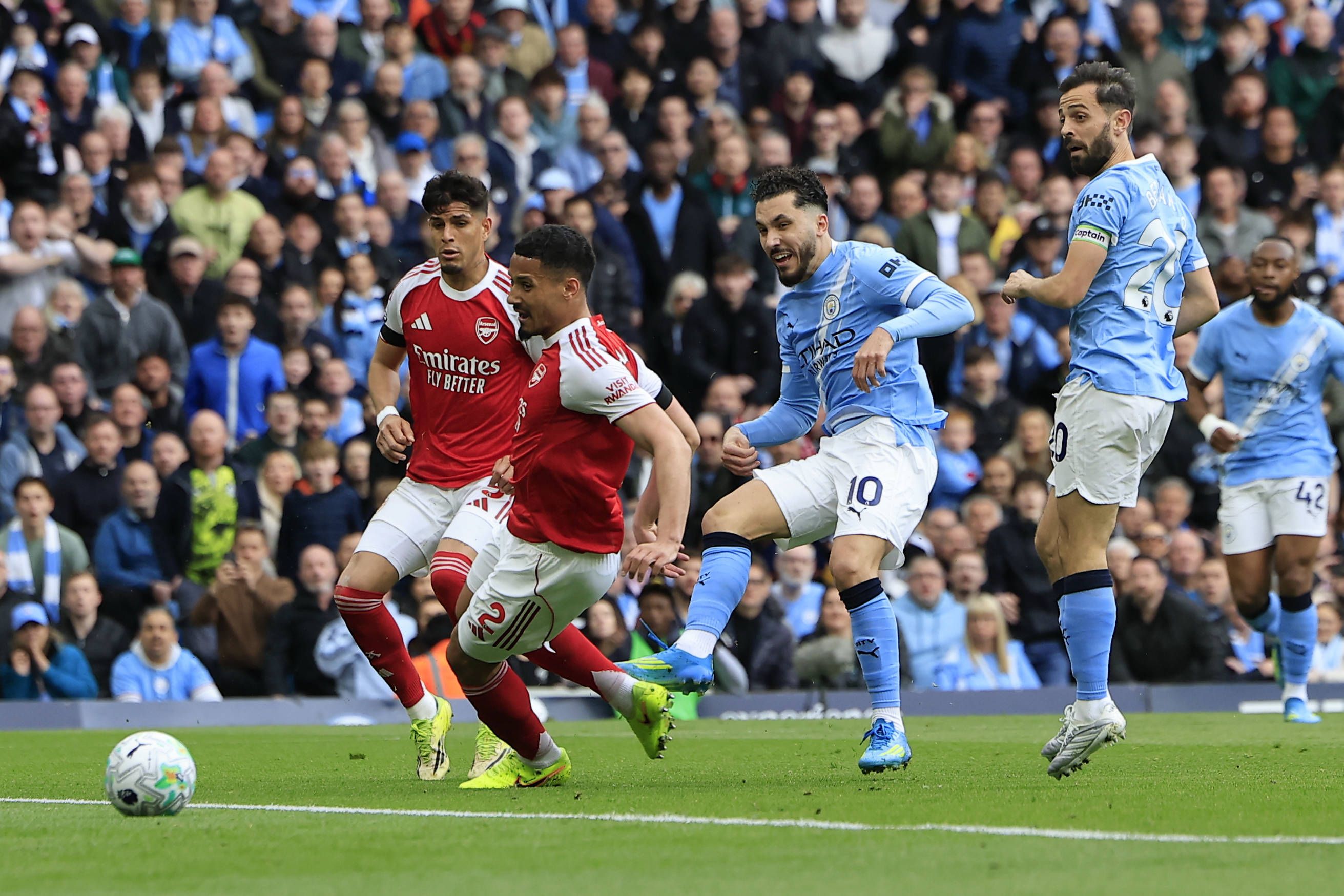 Rayan Cherki of Manchester City scores to make it 1-0 against Arsenal at the Etihad Stadium