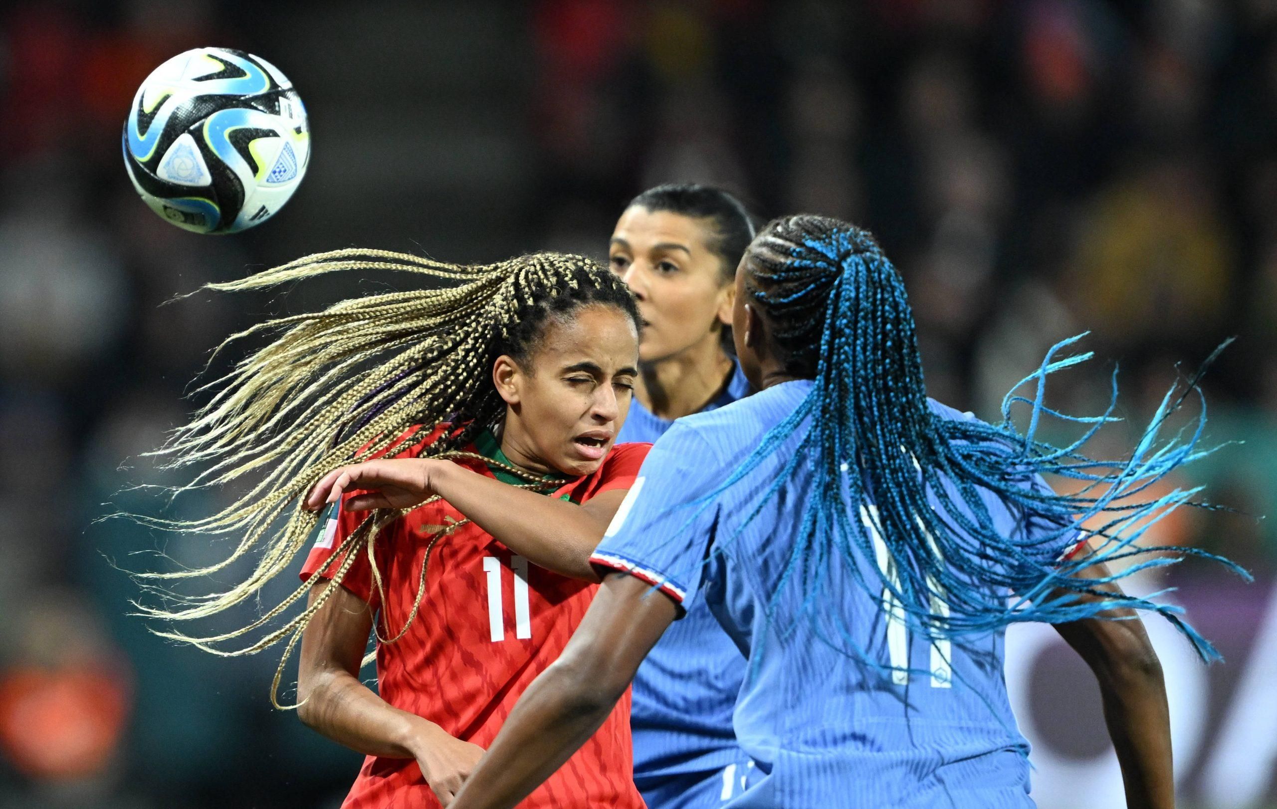 Fatima Tagnaout L of Morocco vies with Kadidiatou Diani of France during the round of 16 match between France and Morocco