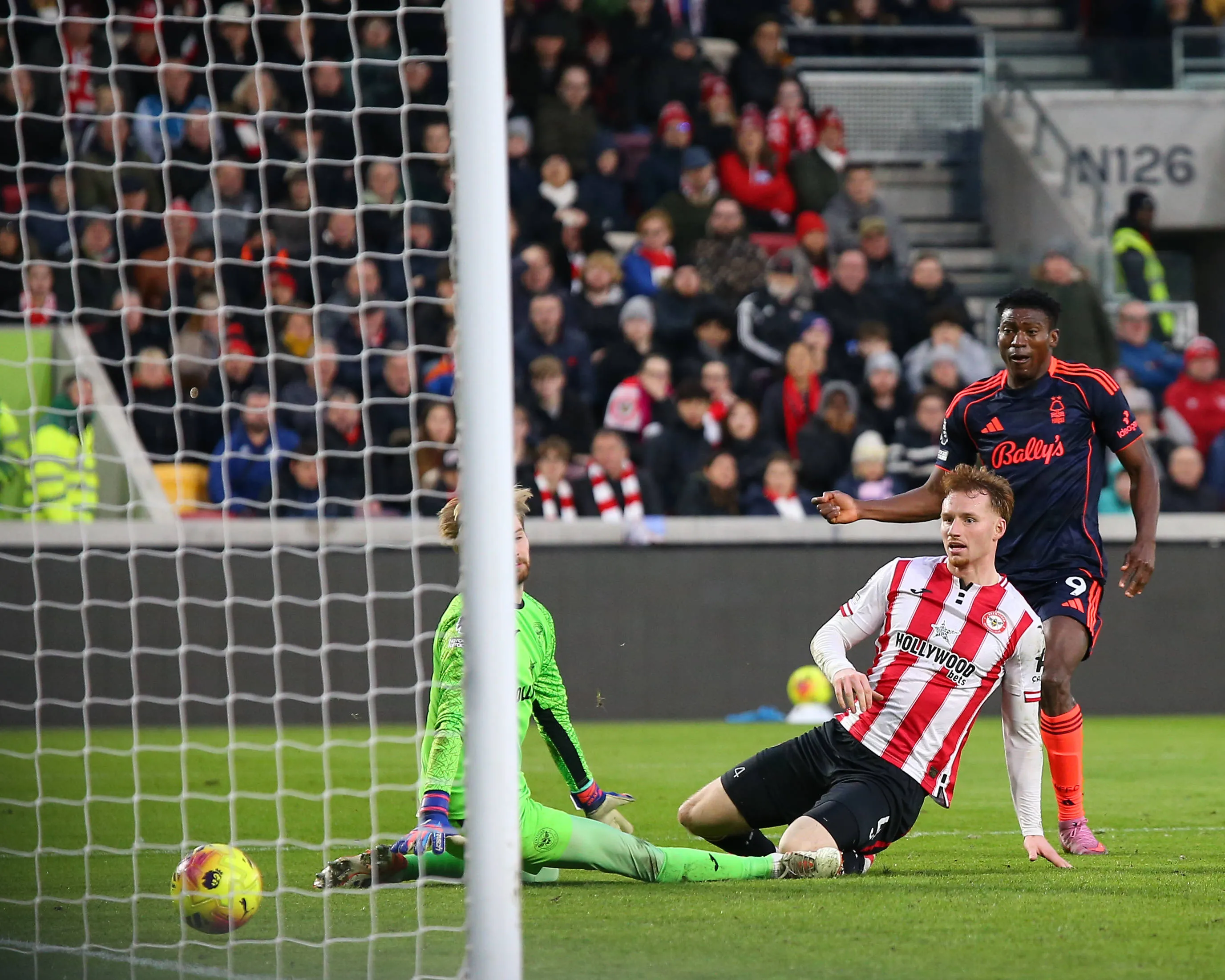 Taiwo Awoniyi slots ball past Caoimhin Kelleher