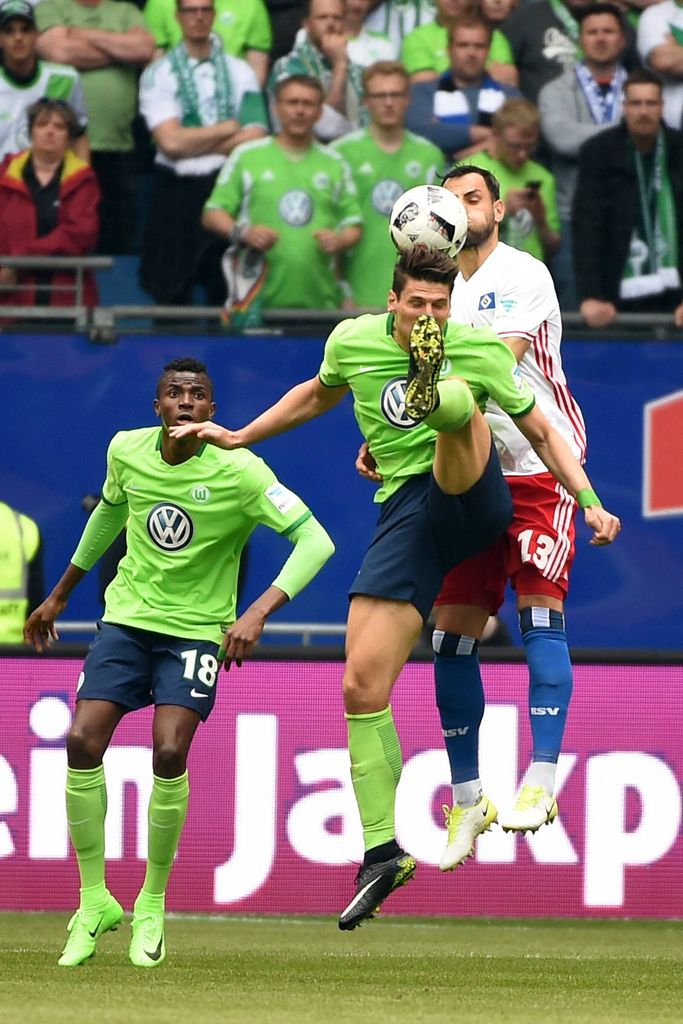 Mario Gomez, Mergim Mavraj and Victor Osimhen all celebrate after VfL Wolfsburg