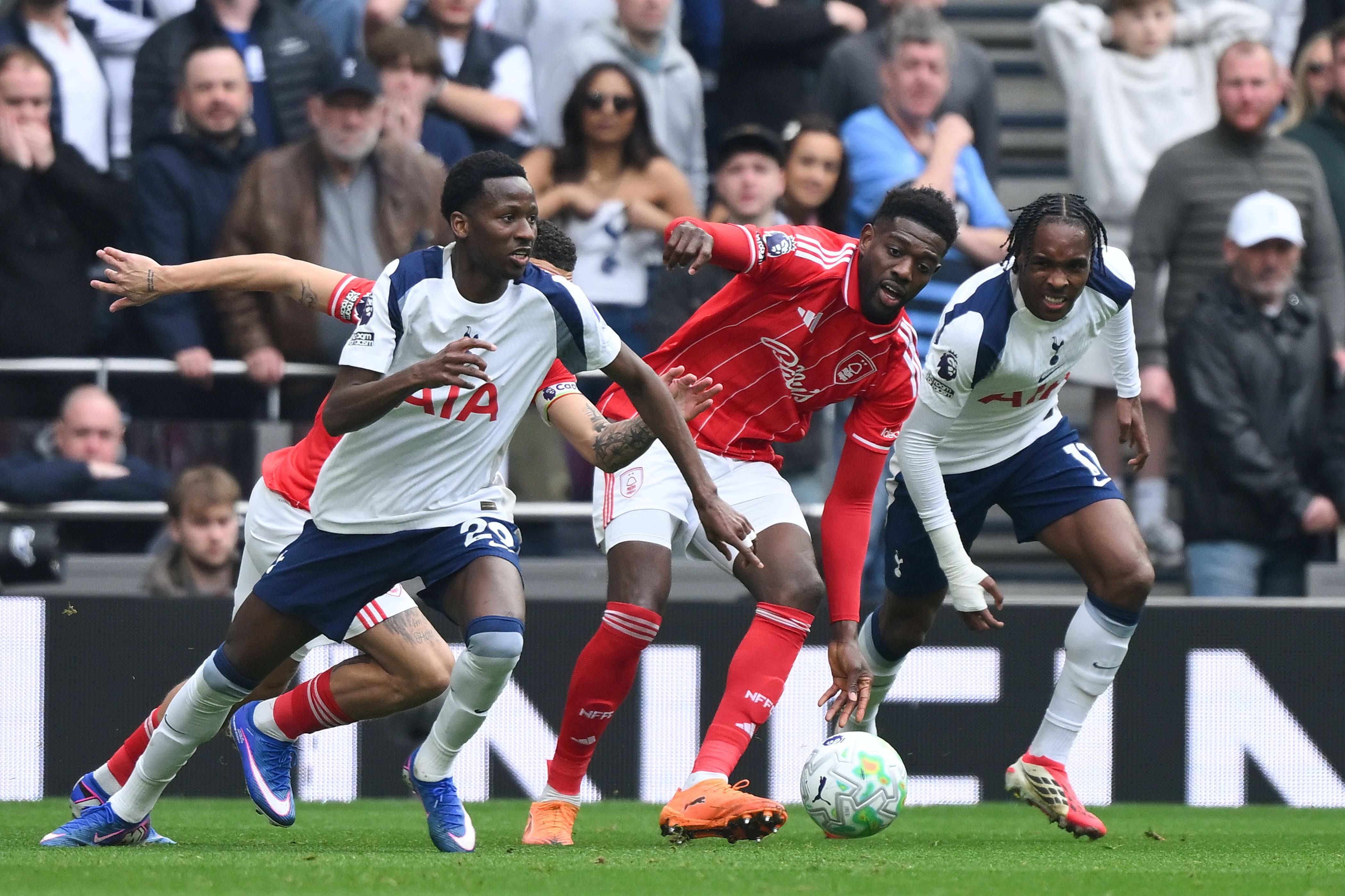 Ibrahim Sangare is under pressure from Mohammed Kudus and Mathys Tel during the Premier League match between Tottenham Hotspur and Nottingham Forest