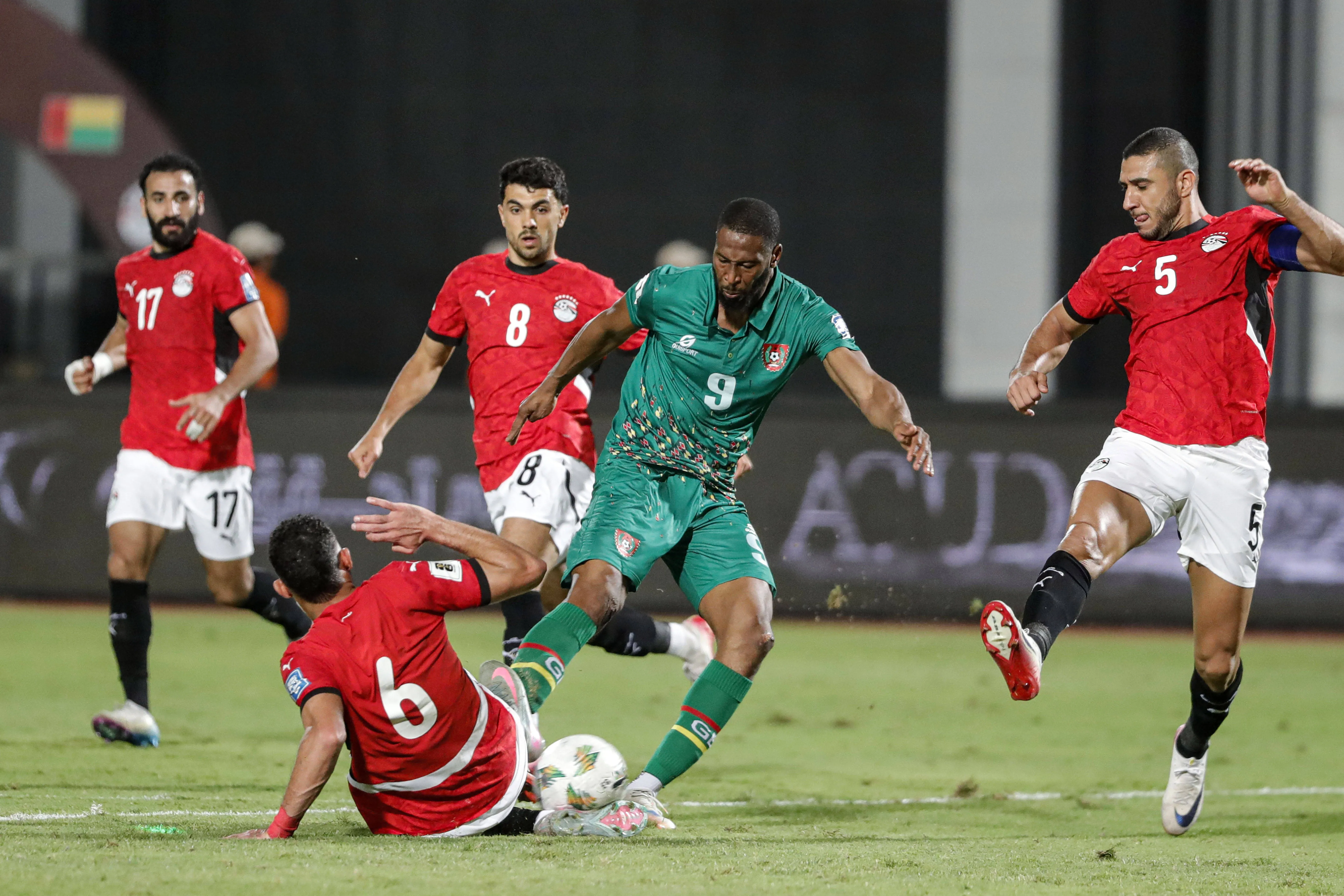 Beto of Guinea-Bissau vies for the ball