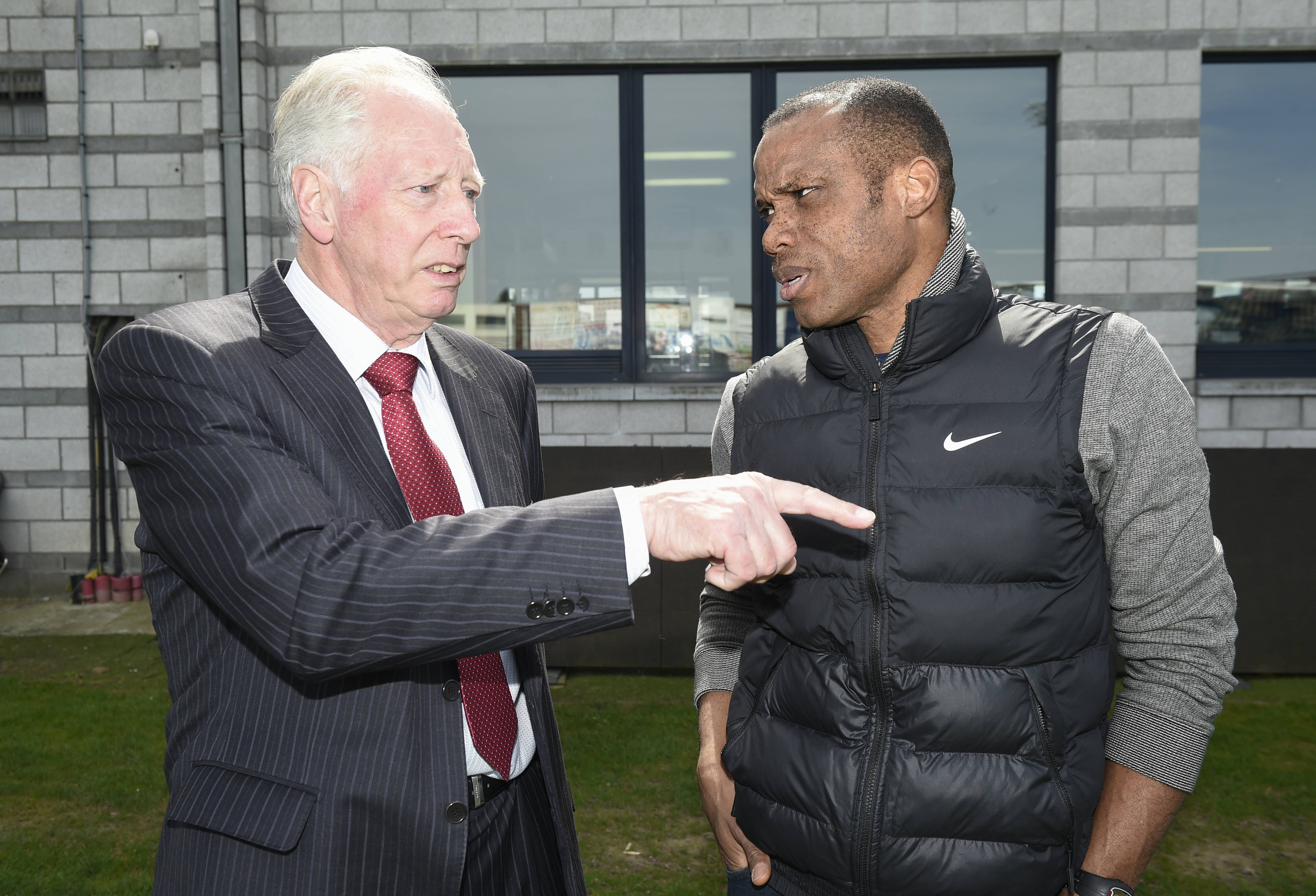 Former Nigerian national head coach Jo Bonfrere talks with Vise head coach Sunday Oliseh