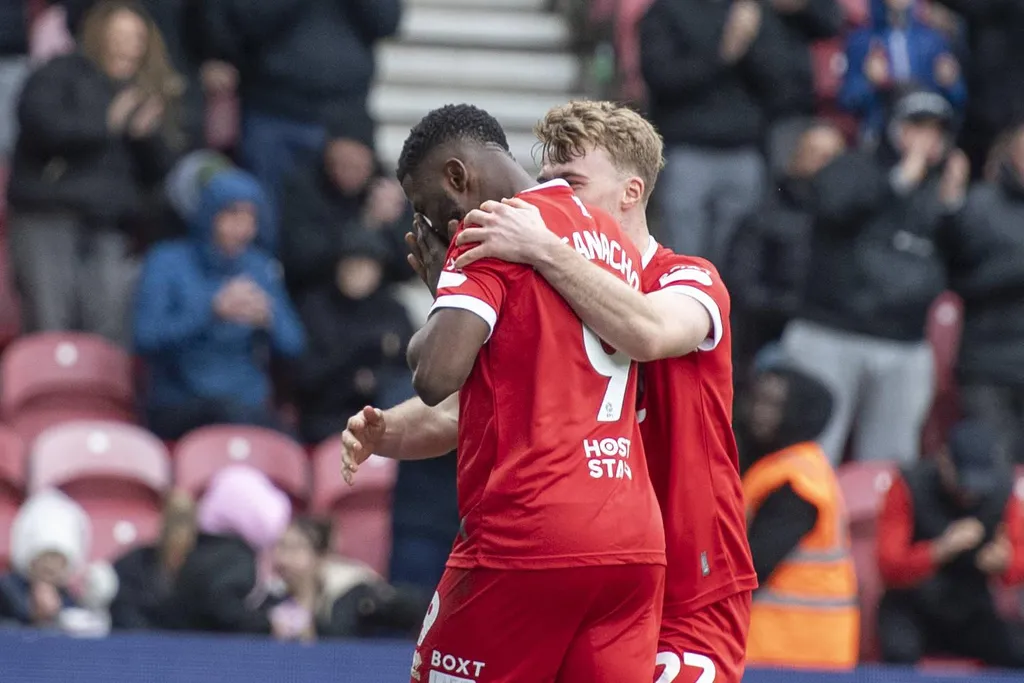 Kelechi Iheanacho scores the equalizer and celebrates with Tommy Conway during the match between Middlesbrough and Oxford United at the Riverside Stadium in Middlesbrough, England,