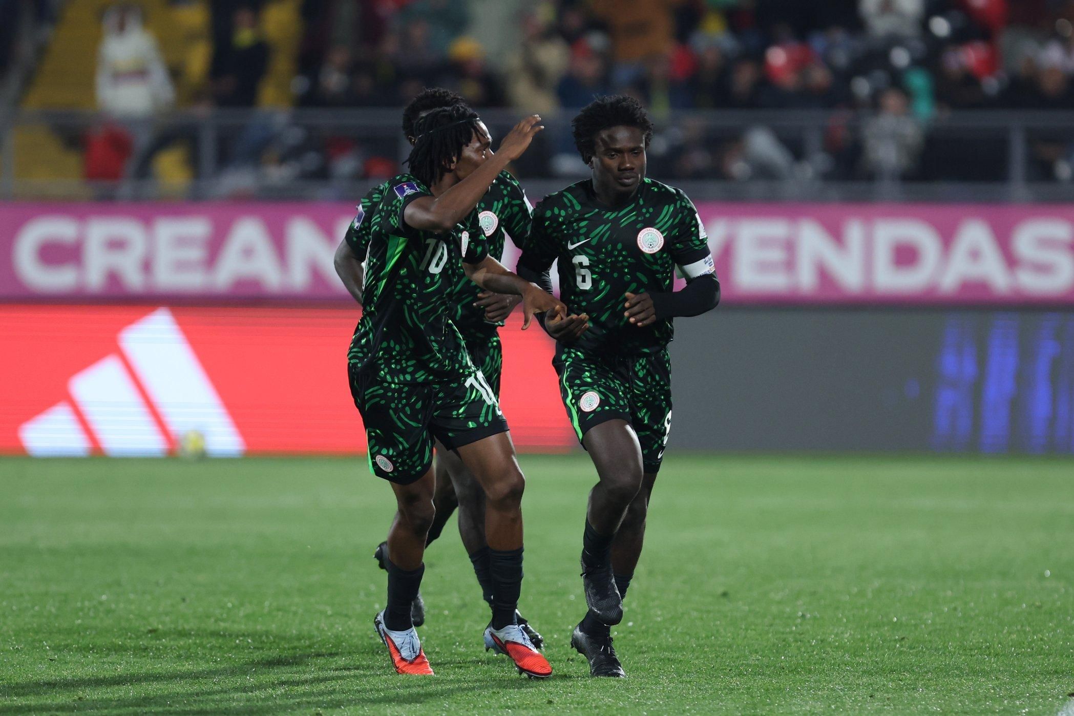 Daniel Bameyi celebrates with the Flying Eagles of Nigeria after scoring a late equaliser against Colombia at the Estadio Fiscal de Talca, Chile, U-20 FIFA World Cup
