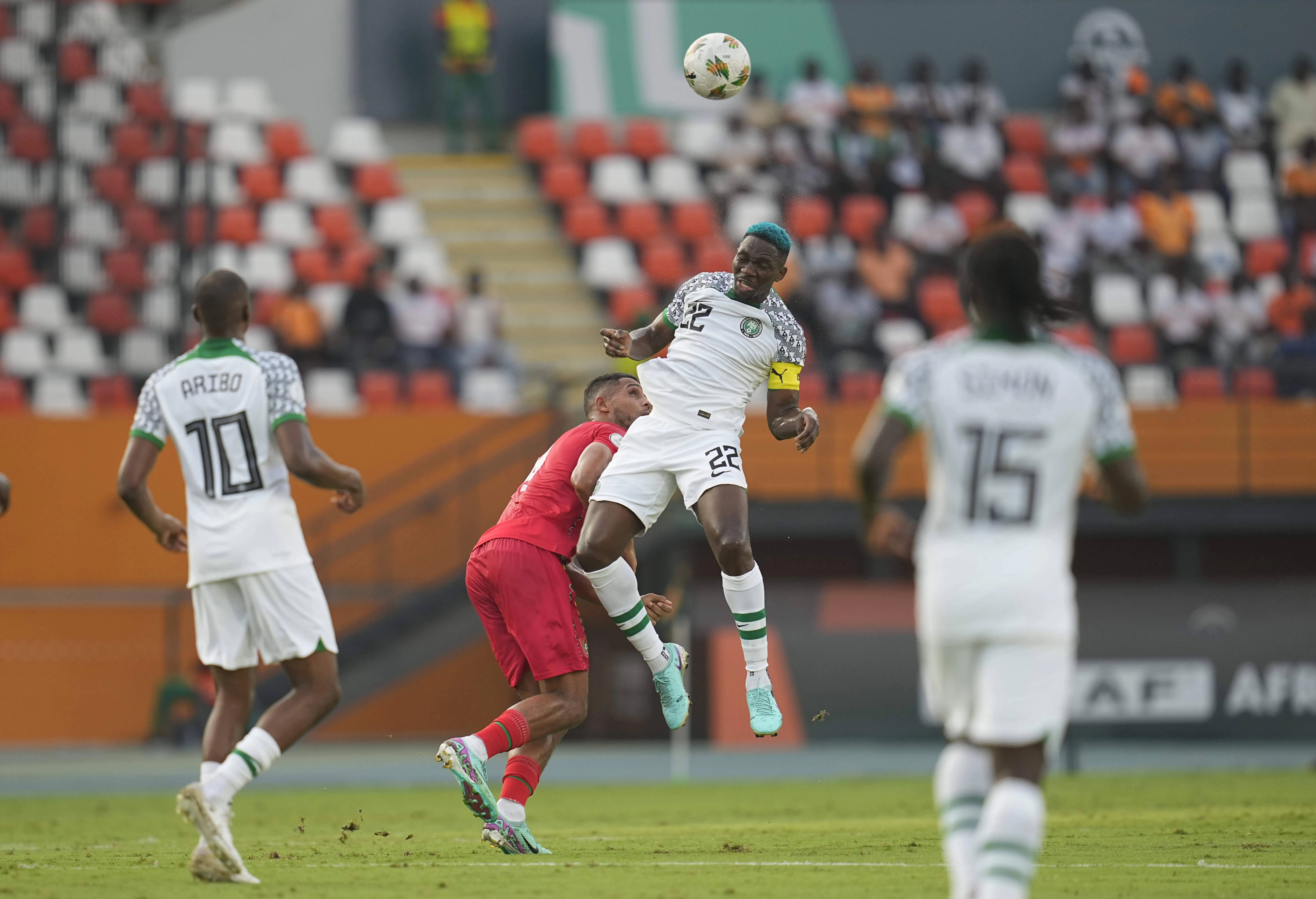 Kenneth Omeruo captaining Nigeria heads clear in the Guinea-Bissau vs Super Eagles AFCON clash