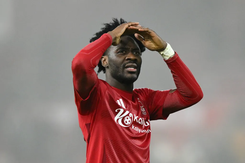 Ola Aina of celebrates victory during the Premier League match between Nottingham Forest and Tottenham Hotspur at the City Ground in Nottingham