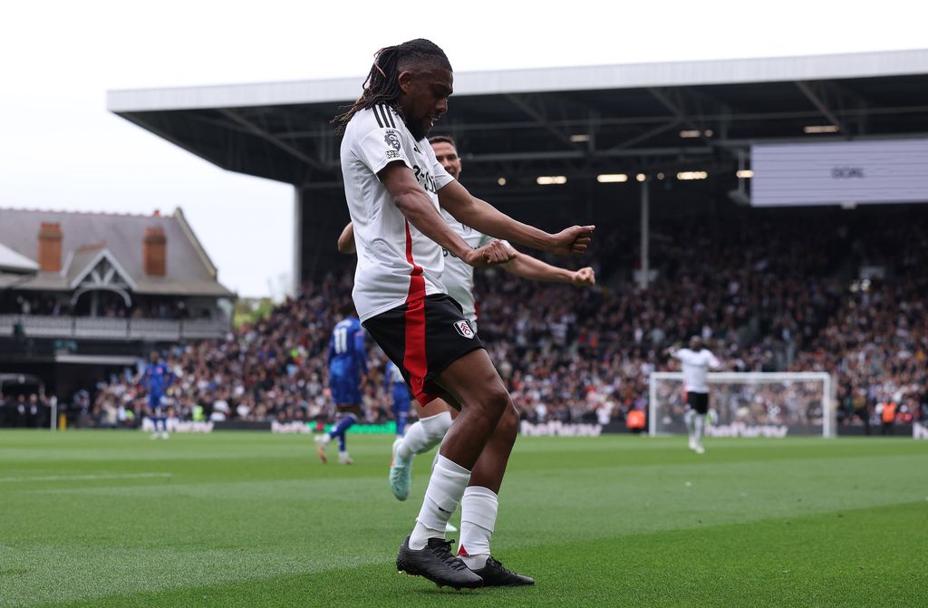  Alex Iwobi celebrates after scoring the opening goal during the Fulham vs Chelsea Premier League match at Craven Cottage, London