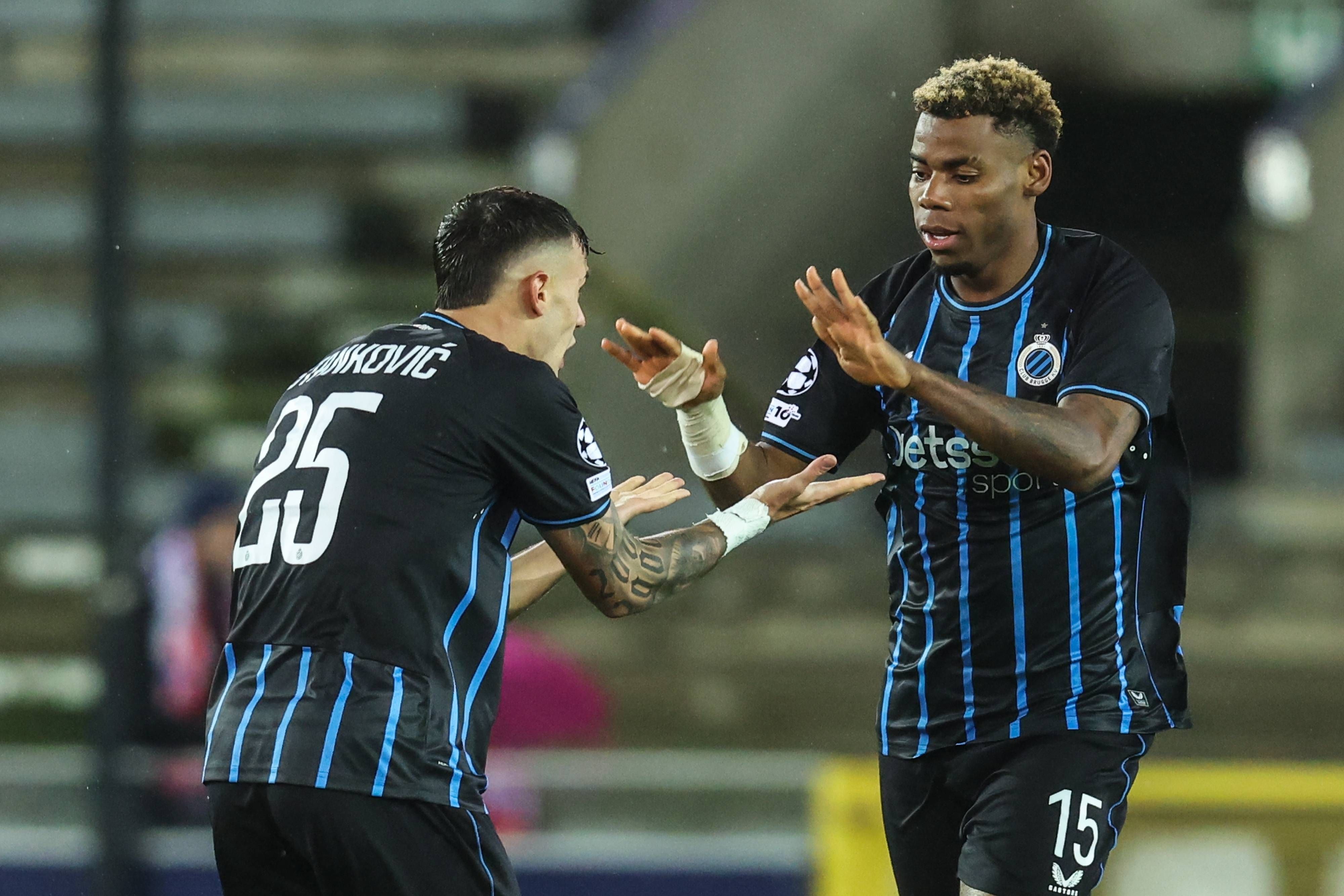 Raphael Onyedika celebrates after scoring during a soccer game between Belgian Club Brugge KV and Spanish Atletico de Madrid