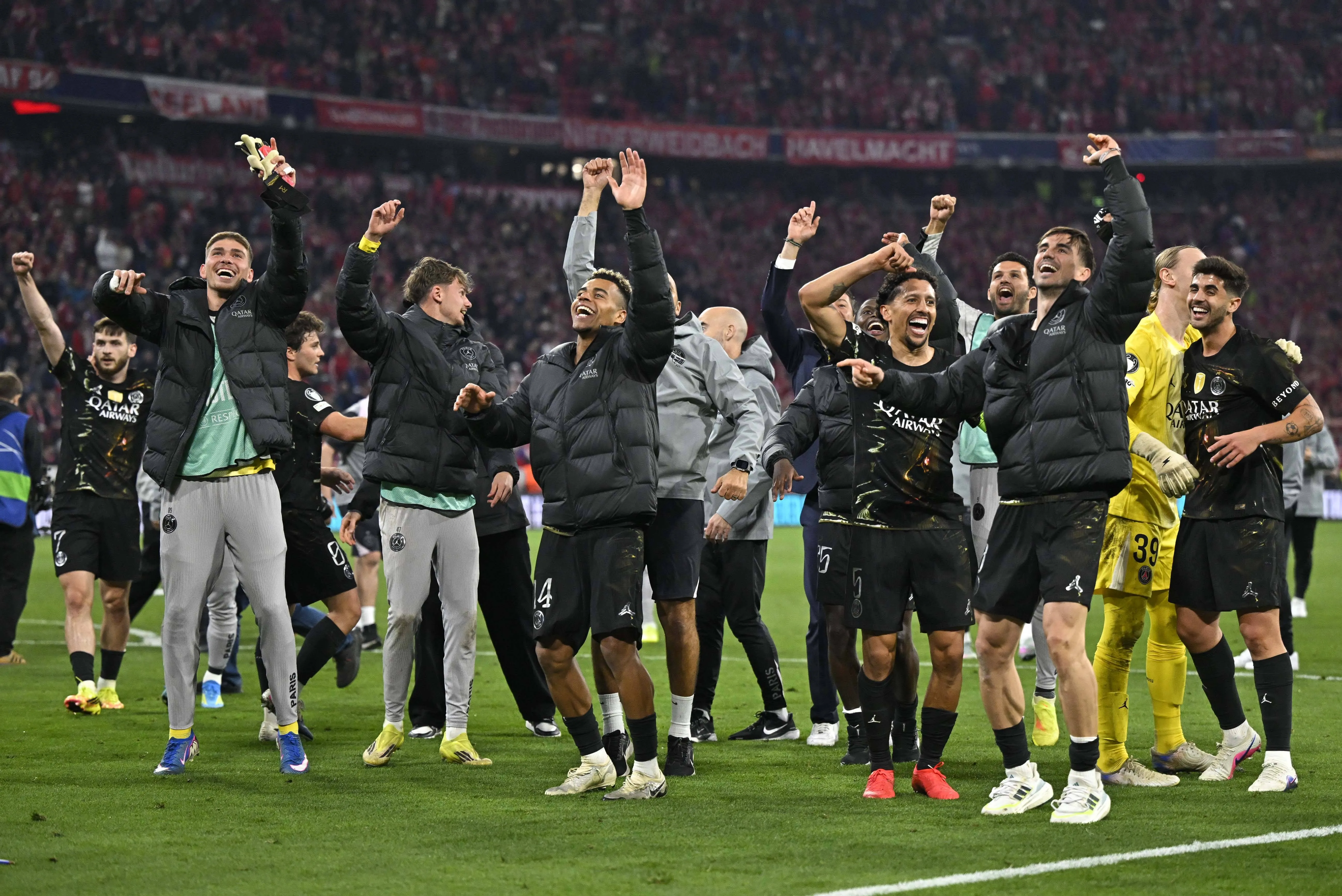 The PSG players celebrate and dance after their Champions League win over Bayern Munich.