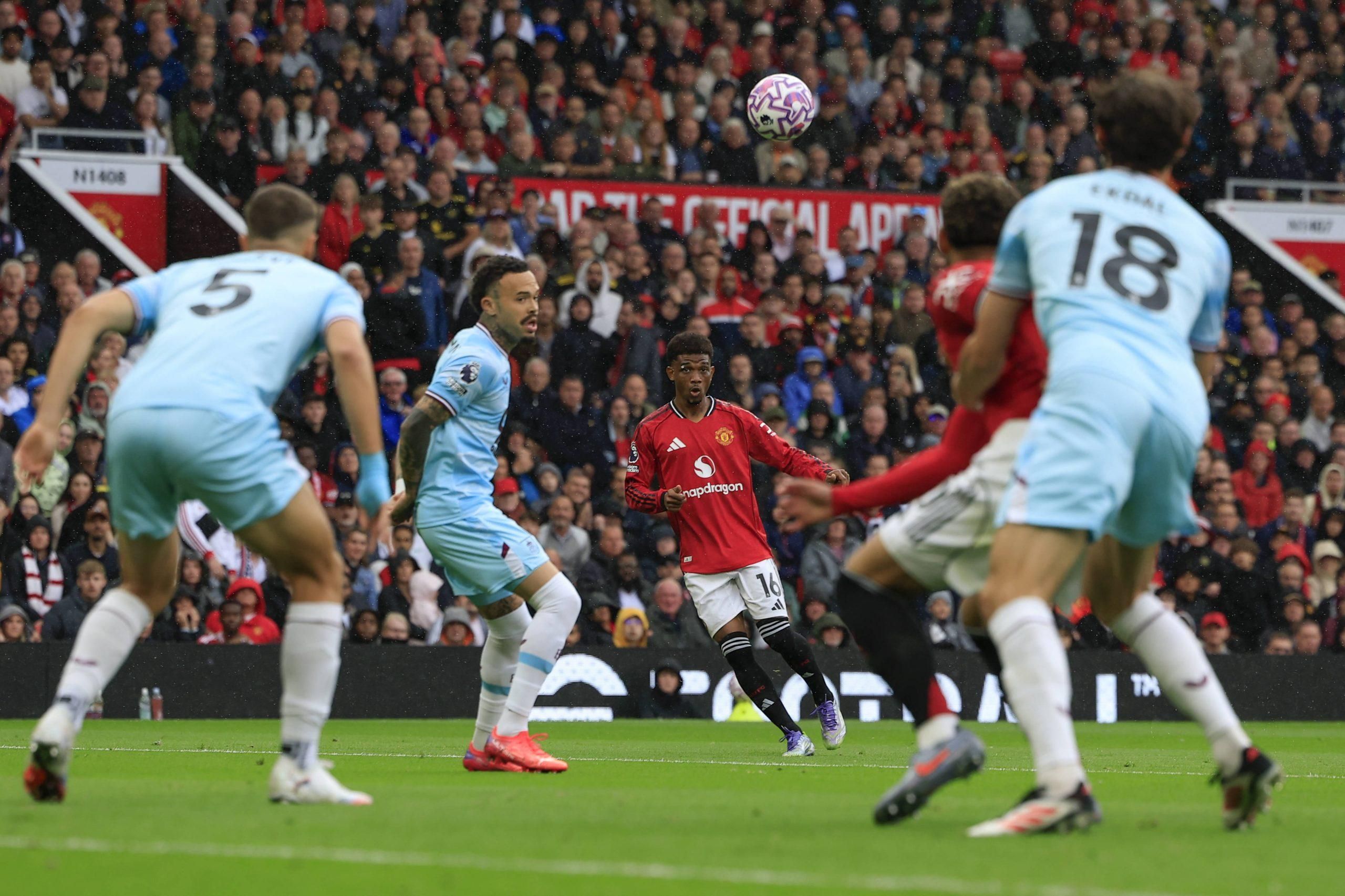 Amad Diallo crosses the ball during the Premier League match between Manchester United and Burnley at Old Trafford