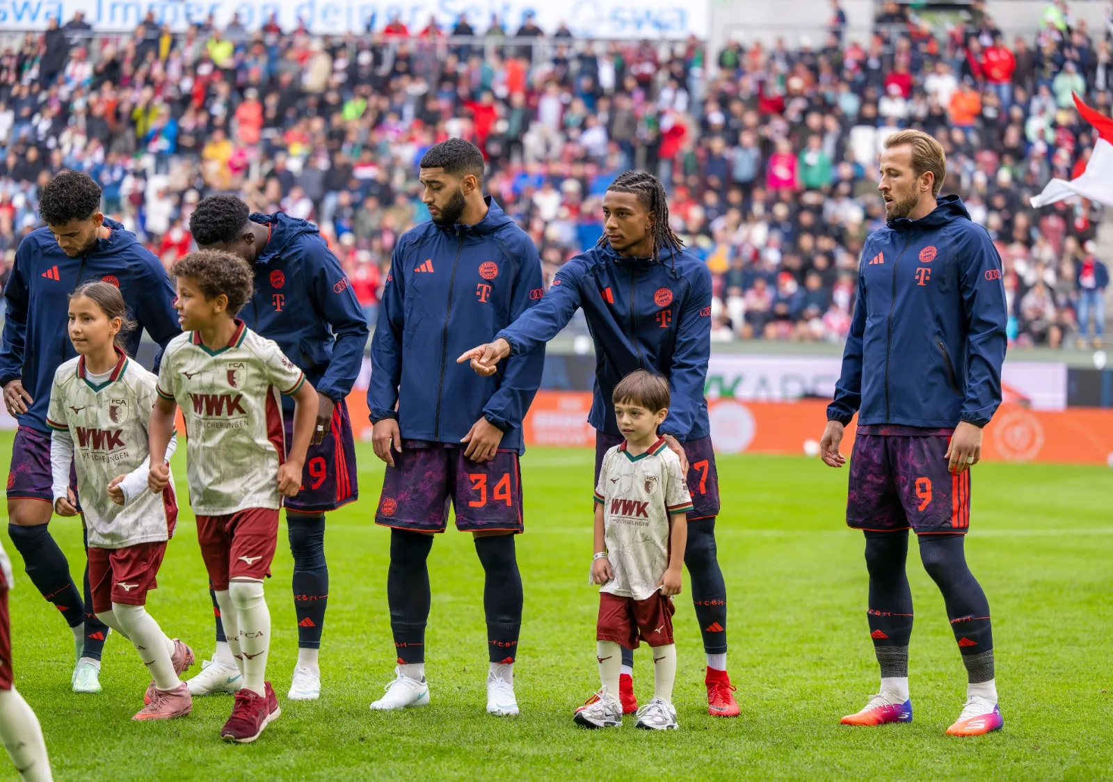 Bayern Munich line-up with Michael Olise and Harry kane.
