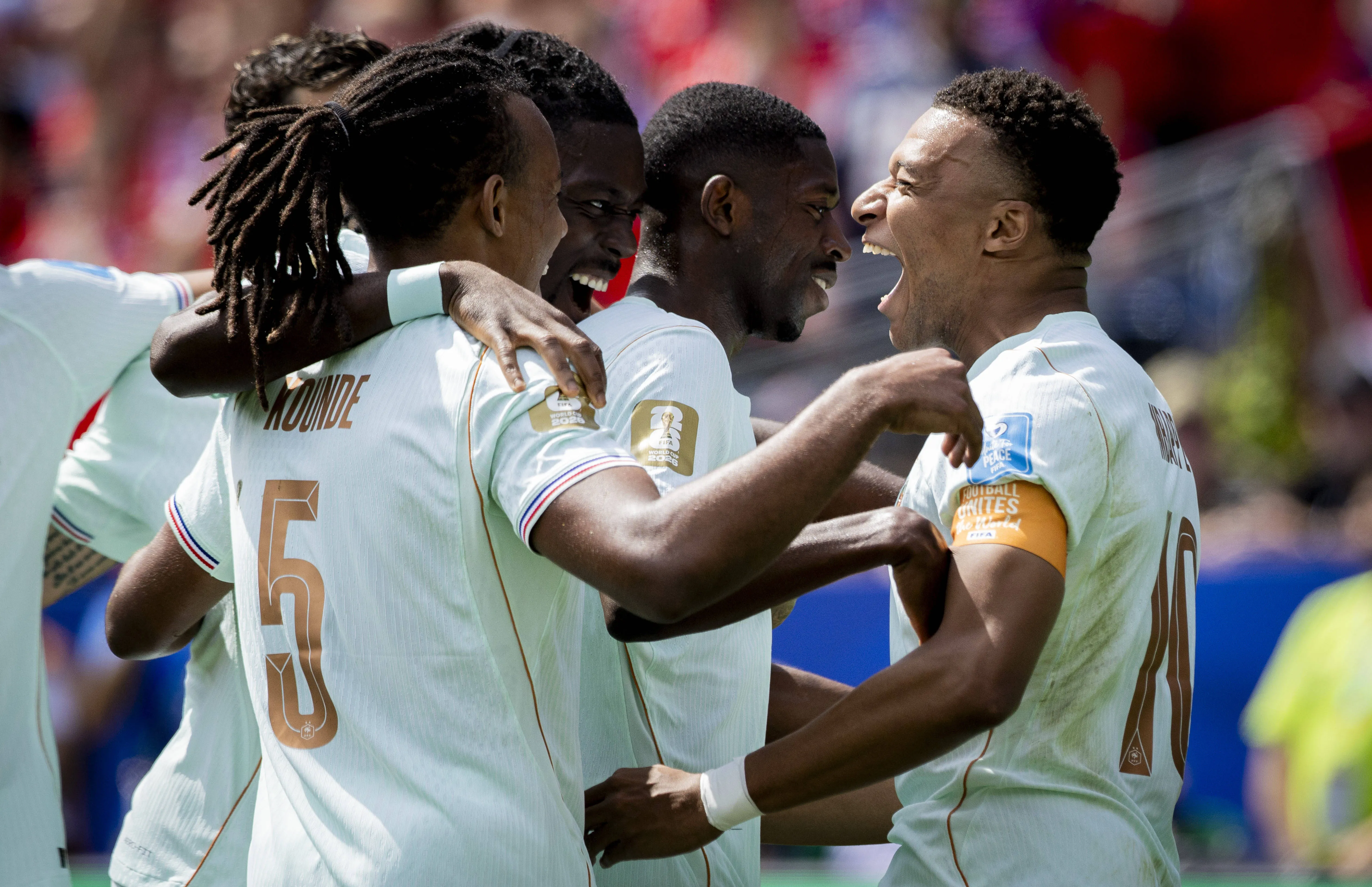 France stars Jules Kounde, Manu Kone, Ousmane Dembele, Kylian Mbappe celebrate a goal 