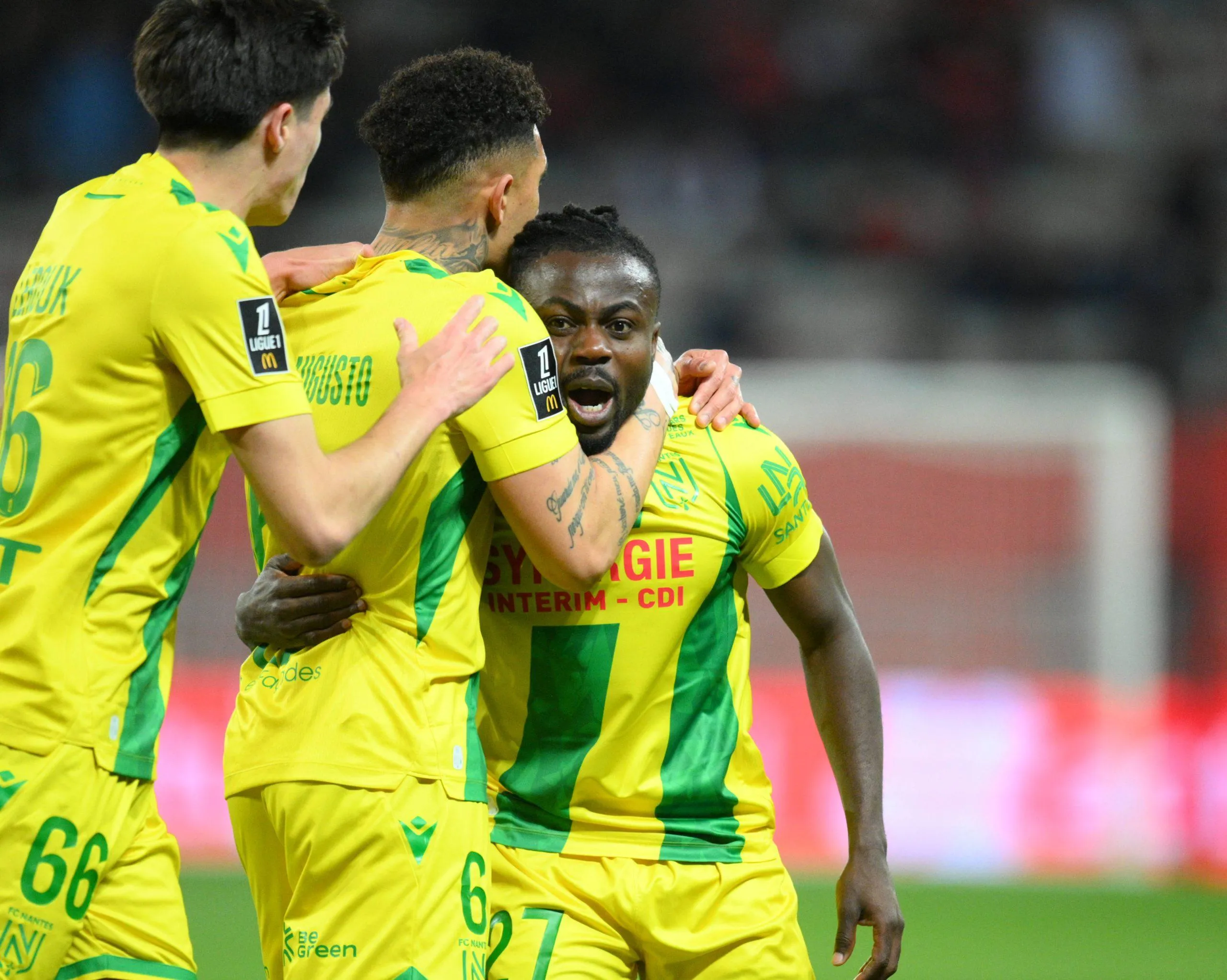 Douglas Augusto and Moses Simon of FC Nantes