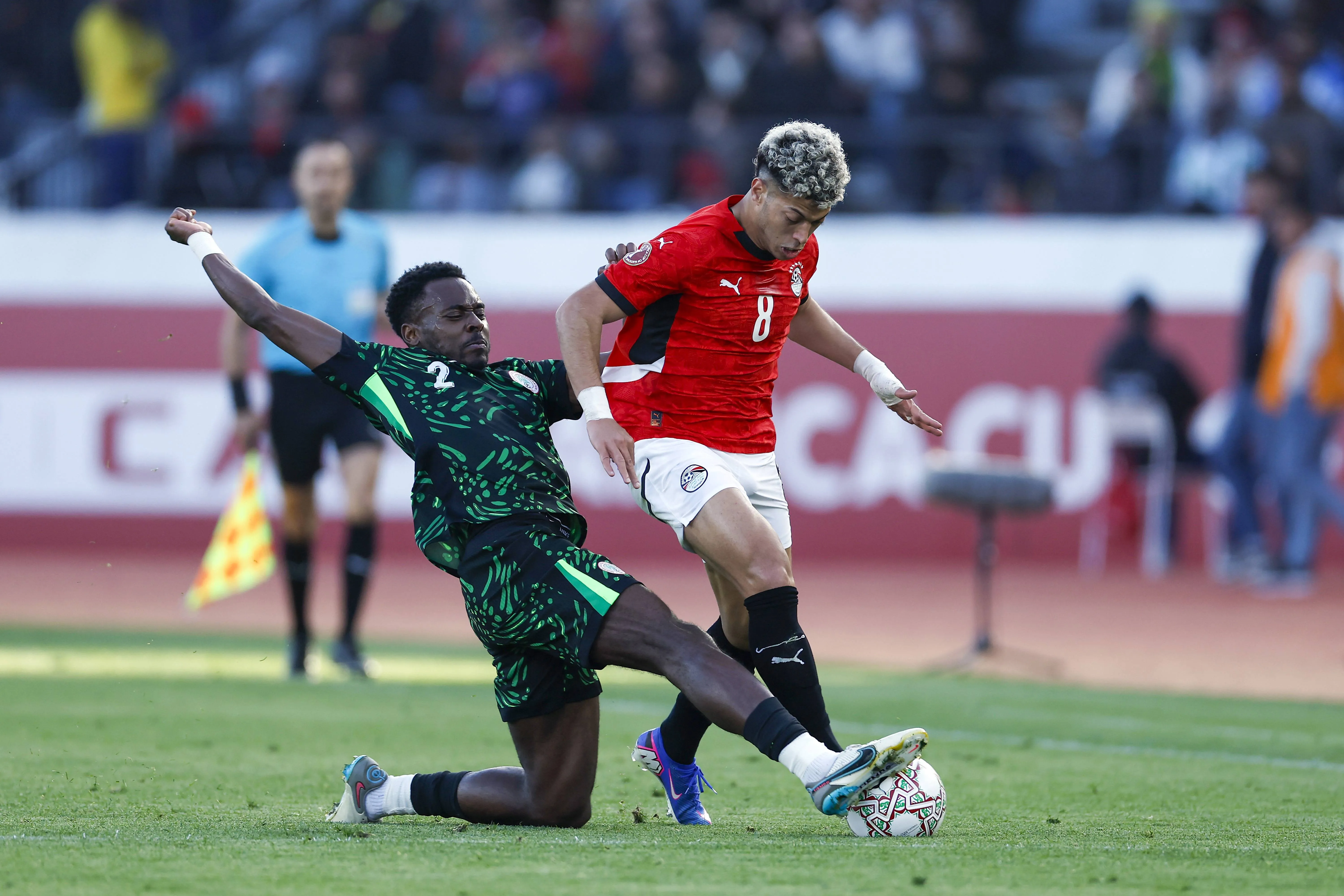 Bright Osayi-Samuel and Emam Ashour during the Africa Cup of Nations playoff between Egypt and Nigeria