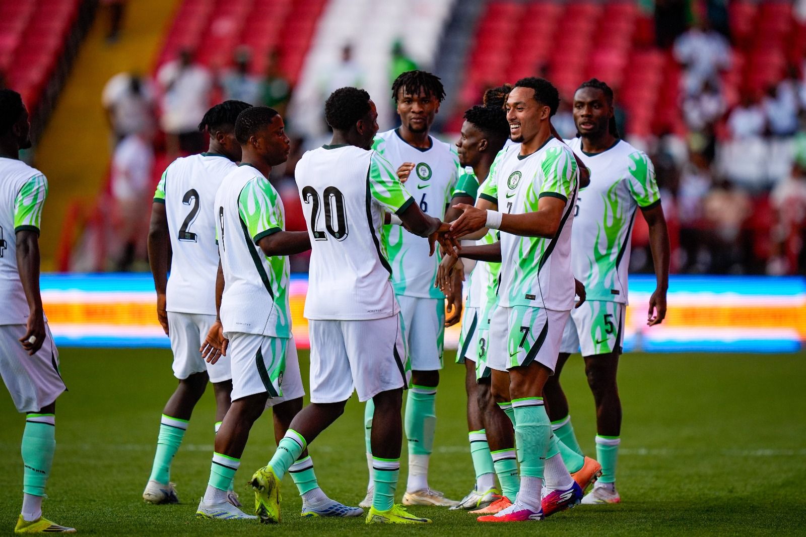 Super Eagles player celebrate. 